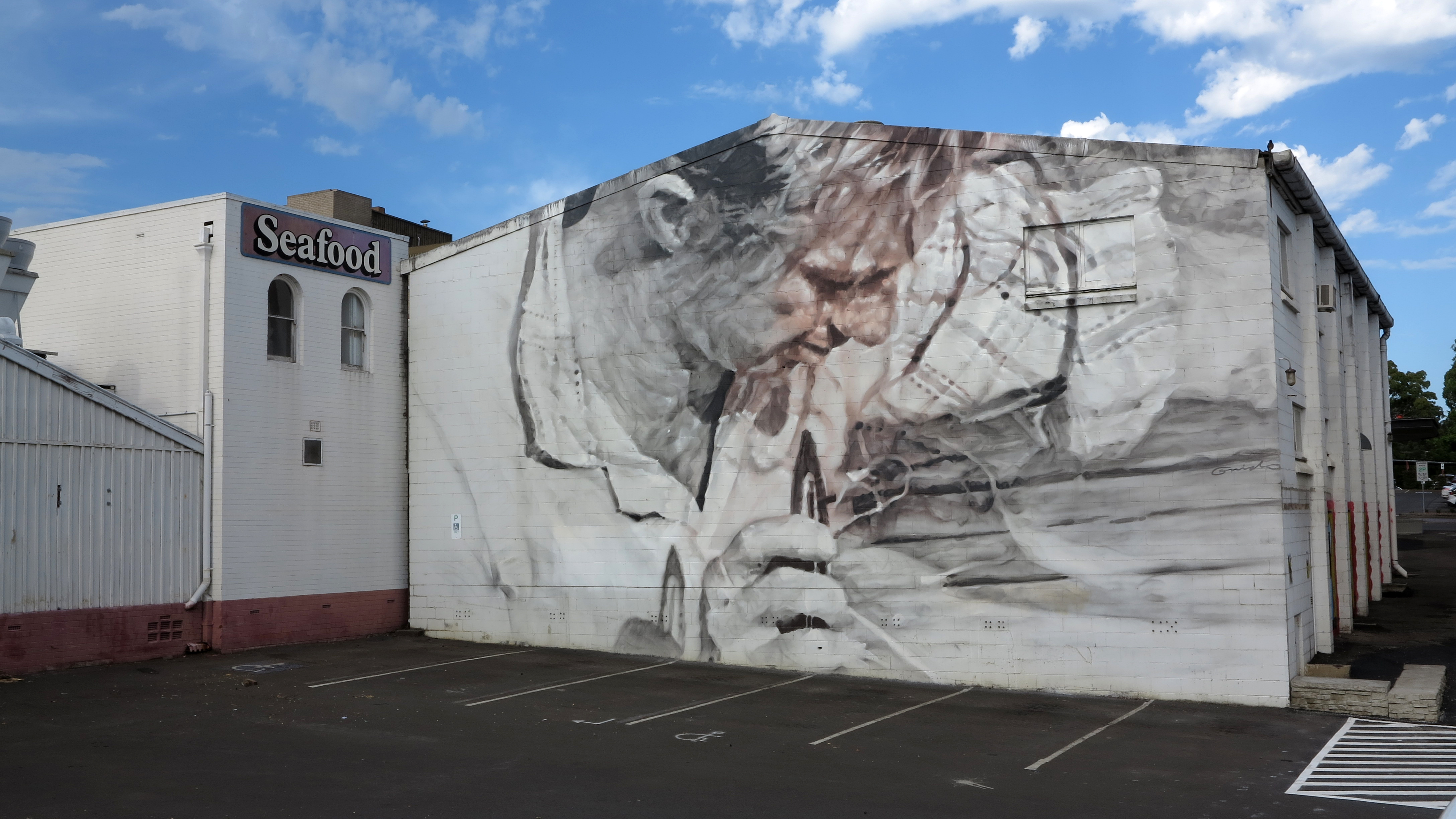 Fisherman at Greenwell Point Nowra, New South Wales,&nbsp;Australia. December 2014 Photograph: Guido van Helten