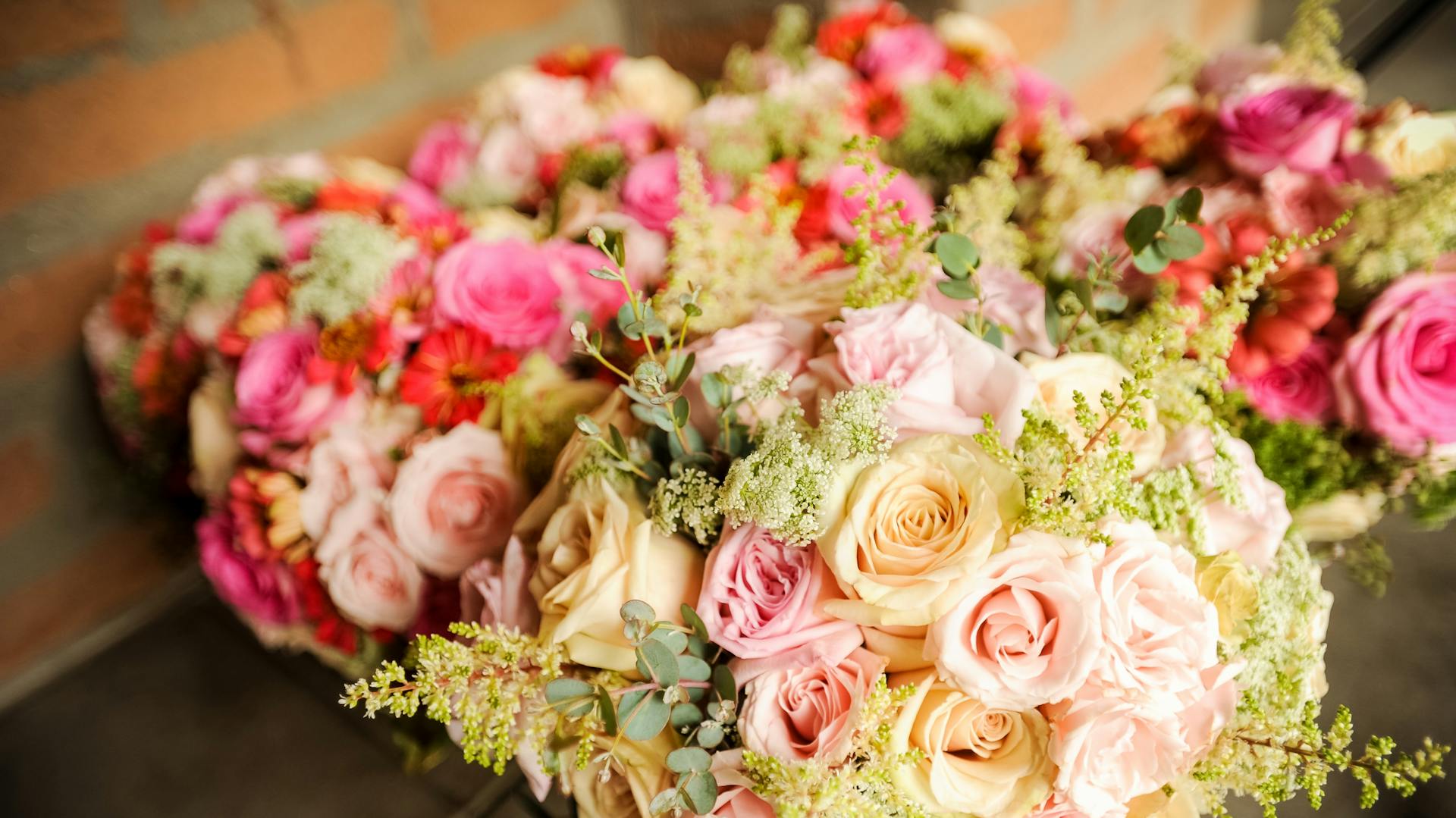 Bouquets of light and dark pink roses.