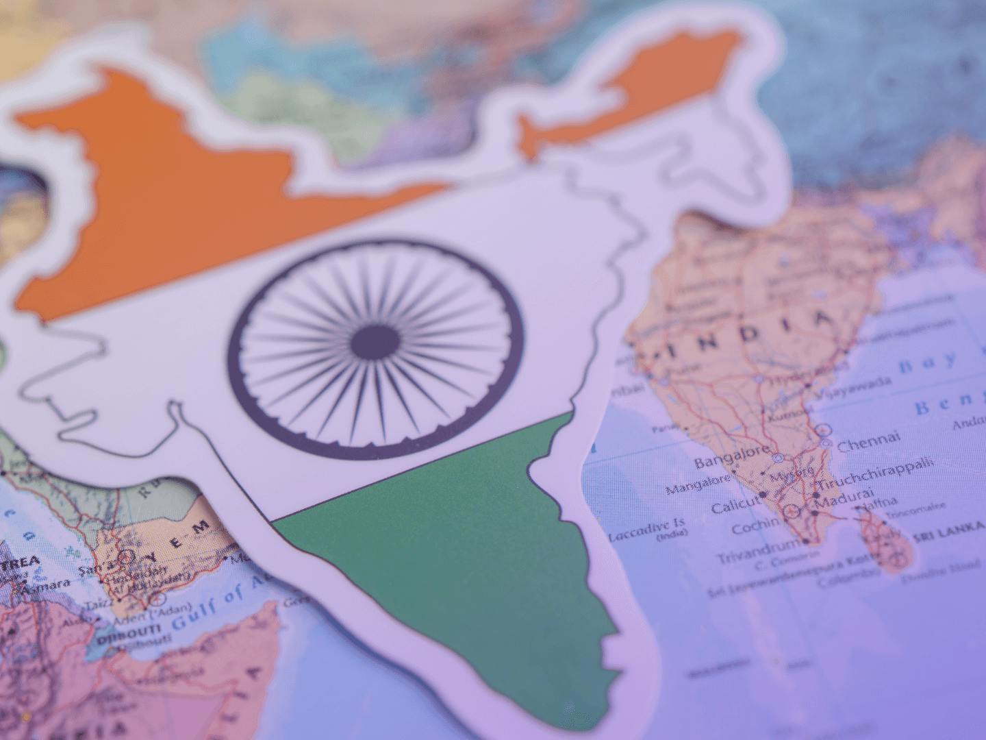 A close-up of a map with an Indian flag on it.