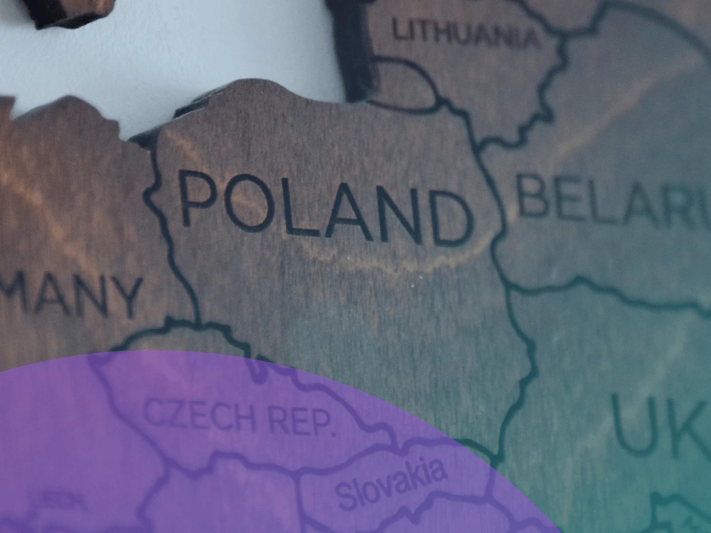 A close-up of a wooden map of Poland.