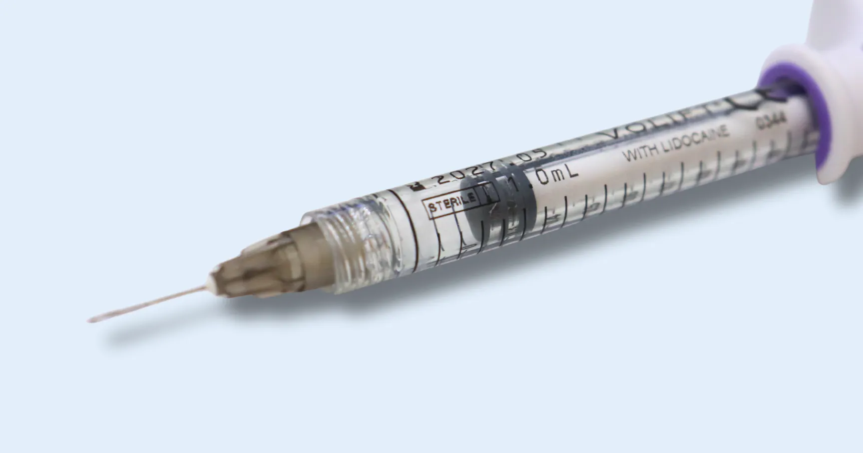 Dermal filler syringe