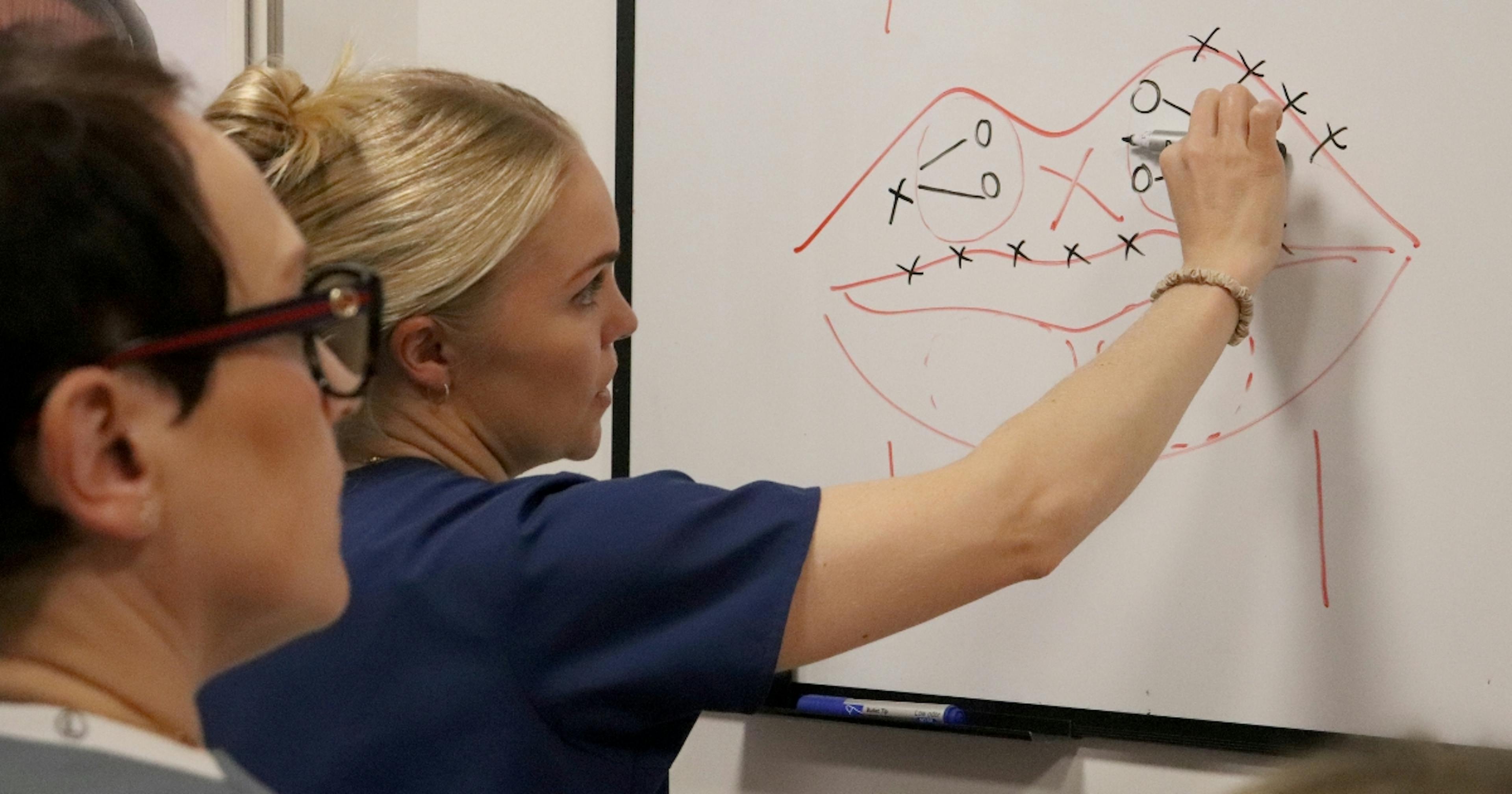 Level 7 Diploma lip filler course mentoring session at Harley Academy
