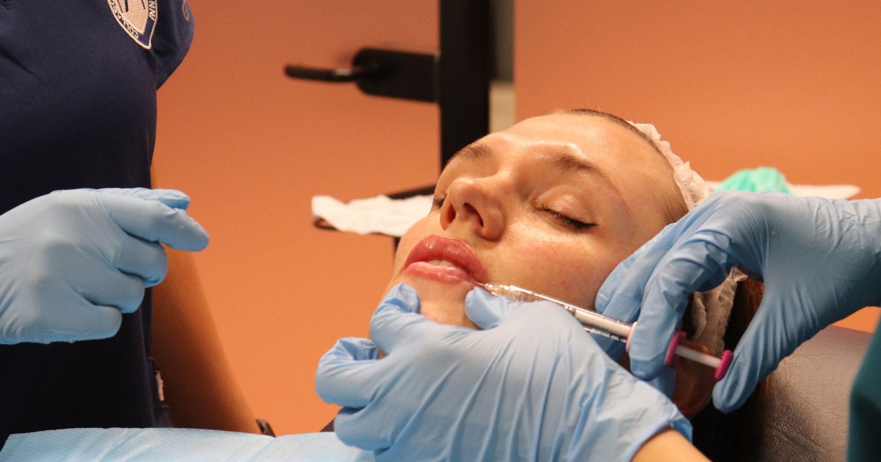 One-to-one mentoring of aesthetics practitioners on the Harley Academy Level 7 Diploma in Injectables training course, London