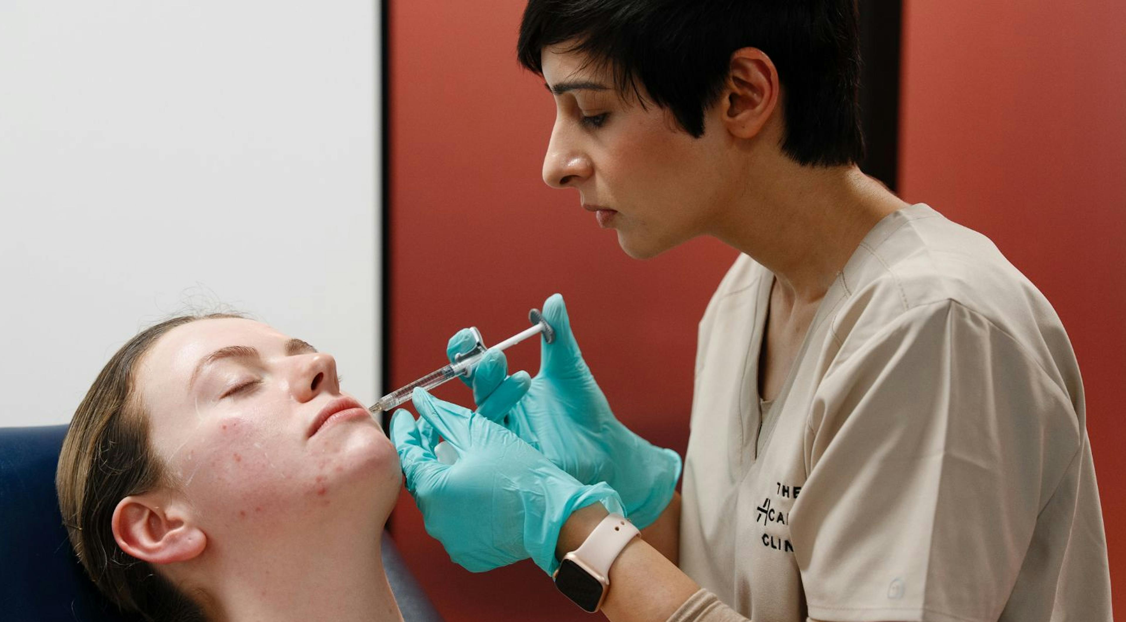 Cheek apex filler being administered by a Harley Academy medical aesthetics training course student