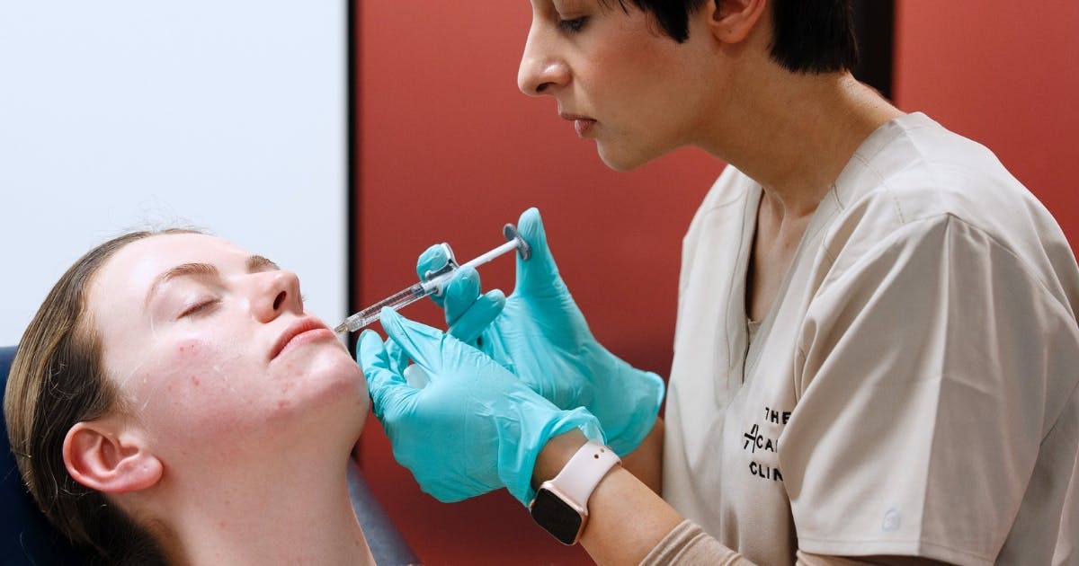 Cheek Filler Treatment during a Clinical Placement session at Harley Academy London medical aesthetics course