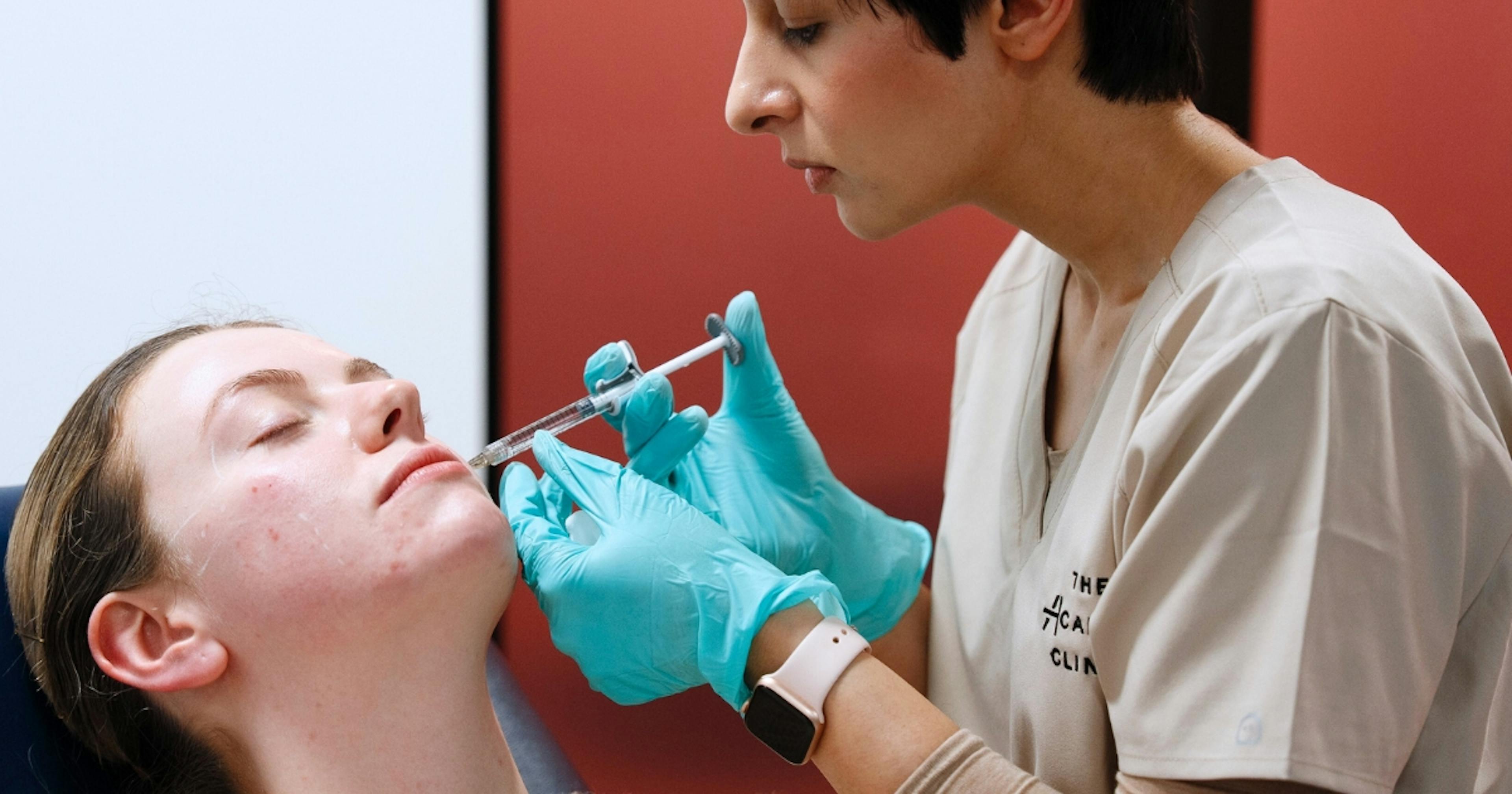 Cheek Filler Treatment during a Clinical Placement session at Harley Academy London medical aesthetics course