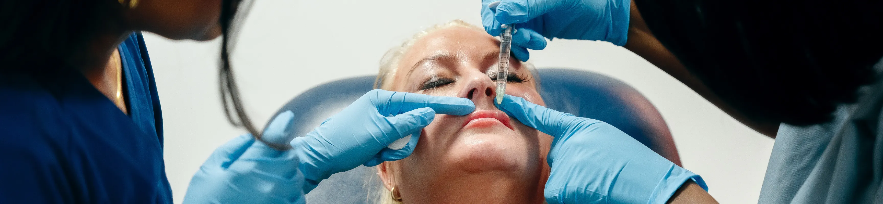 Treating a patient during a Harley Academy lip filler course