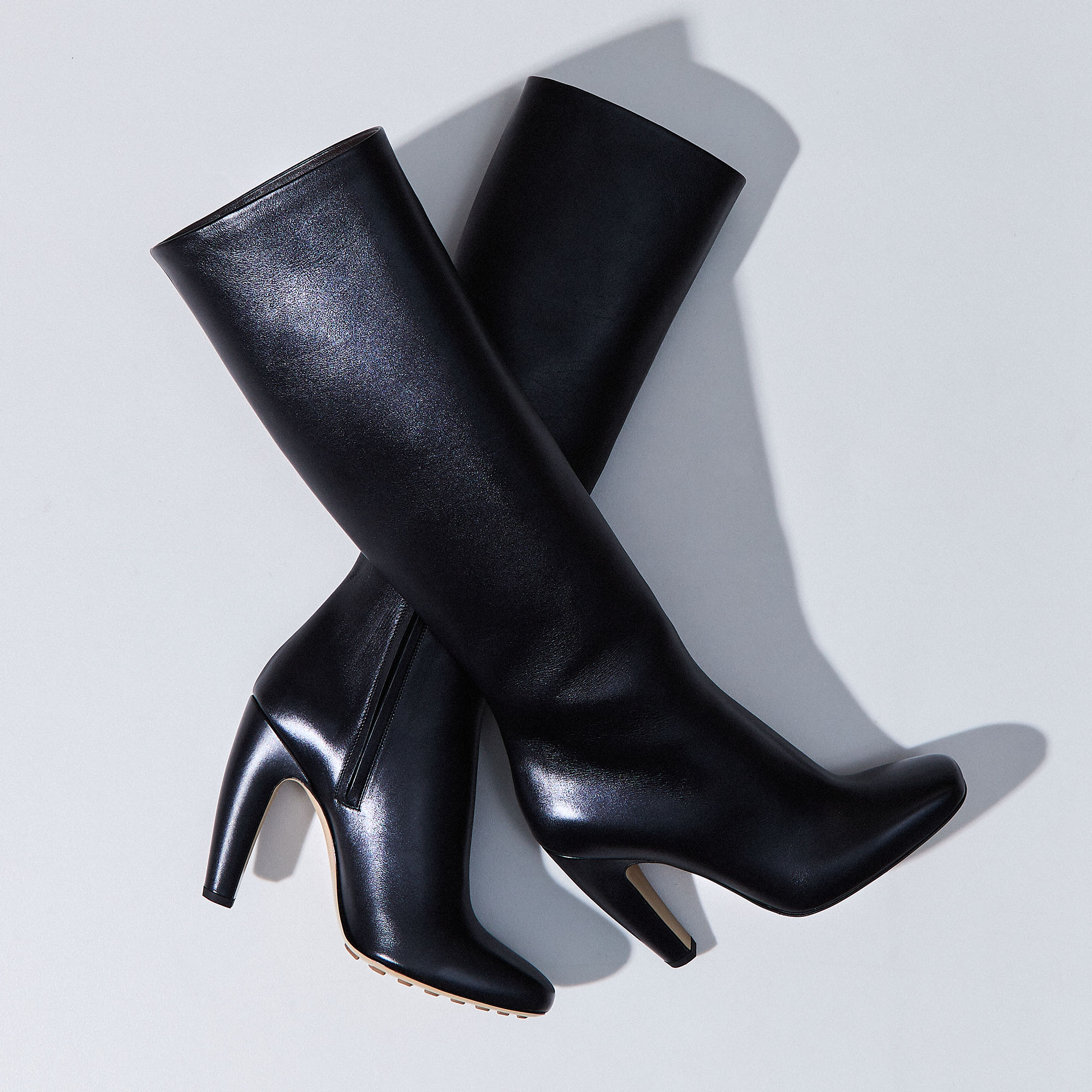 Designer knee high boots hotsell