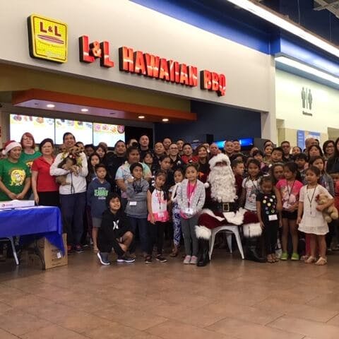 L&L shop with a cop event group picture