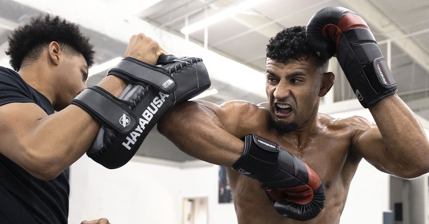 Muay Thai gear including Thai pads and focus mitts