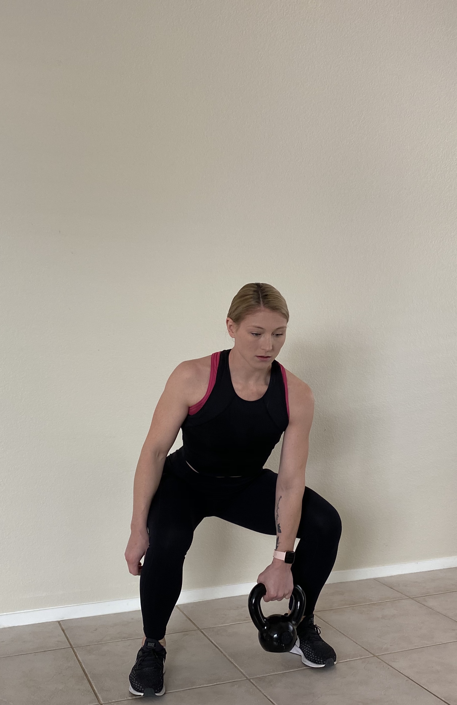 Ashlee Coffey is very strategic when it comes to knocking out her at home workout. She doesn’t just jump into an exercise session from memory. She has everything planned in advance.