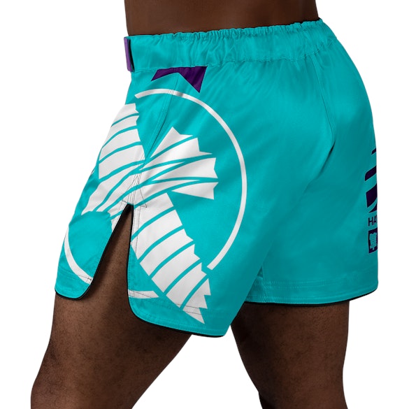 Teal/White Hayabusa Icon Mid-Thigh Fight Shorts - back shot w left side perspective