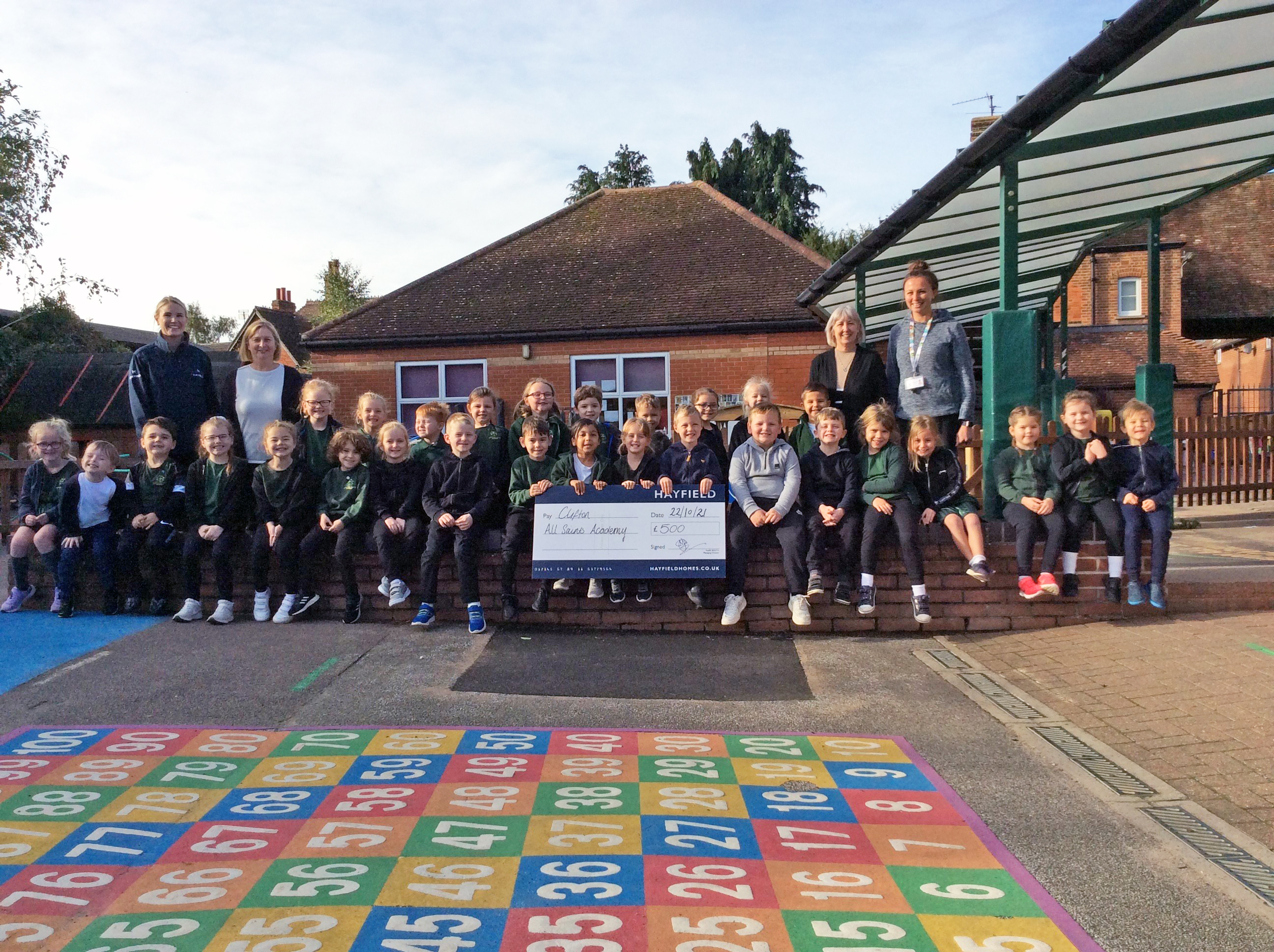Hayfield Donates Funds to Clifton All Saints Academy for an Outdoor