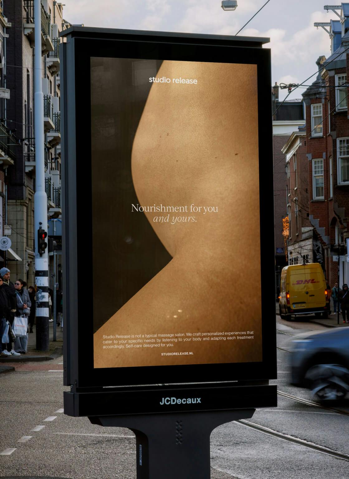 street advertisement billboard with pregnant woman's stomach displayed 