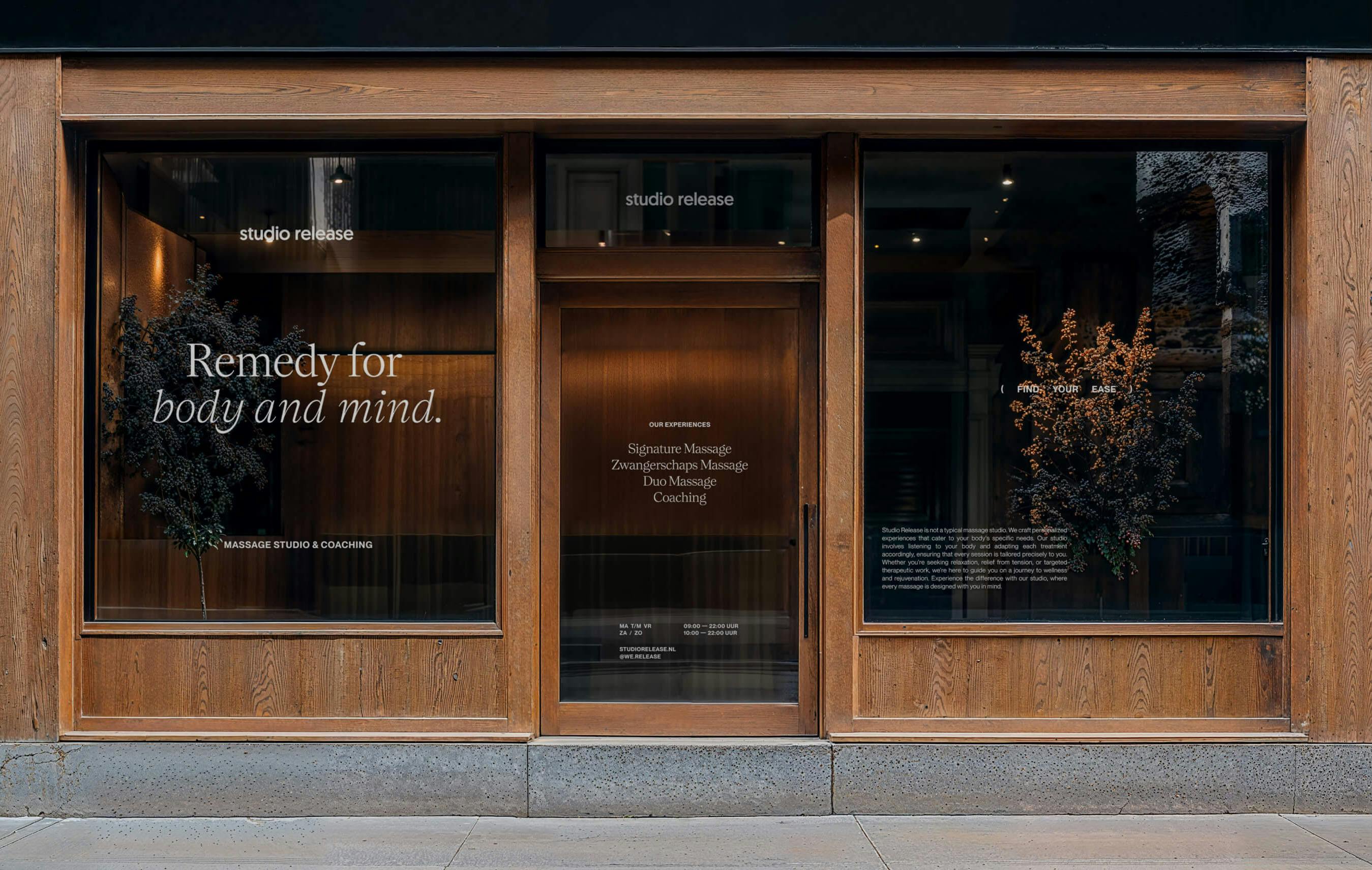 retail storefront with white acrylic window signage