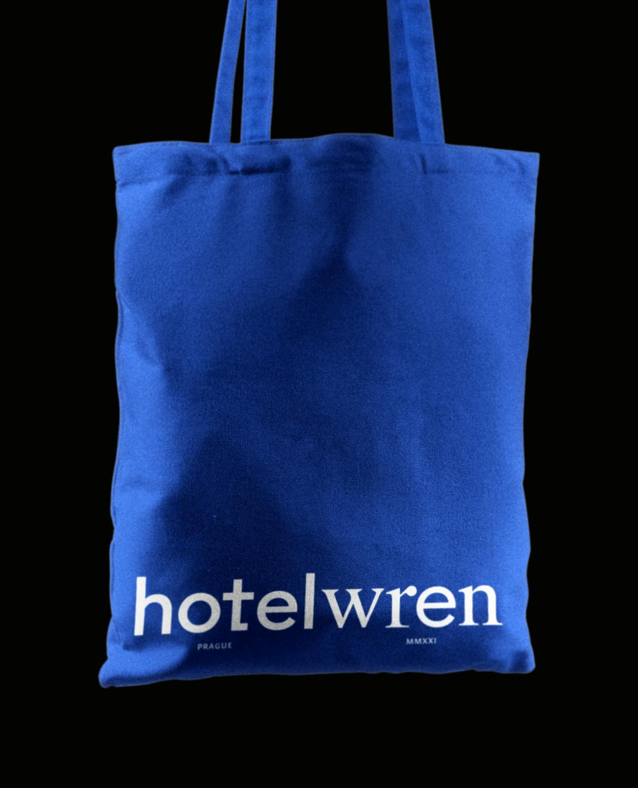 blue tote bag on black background