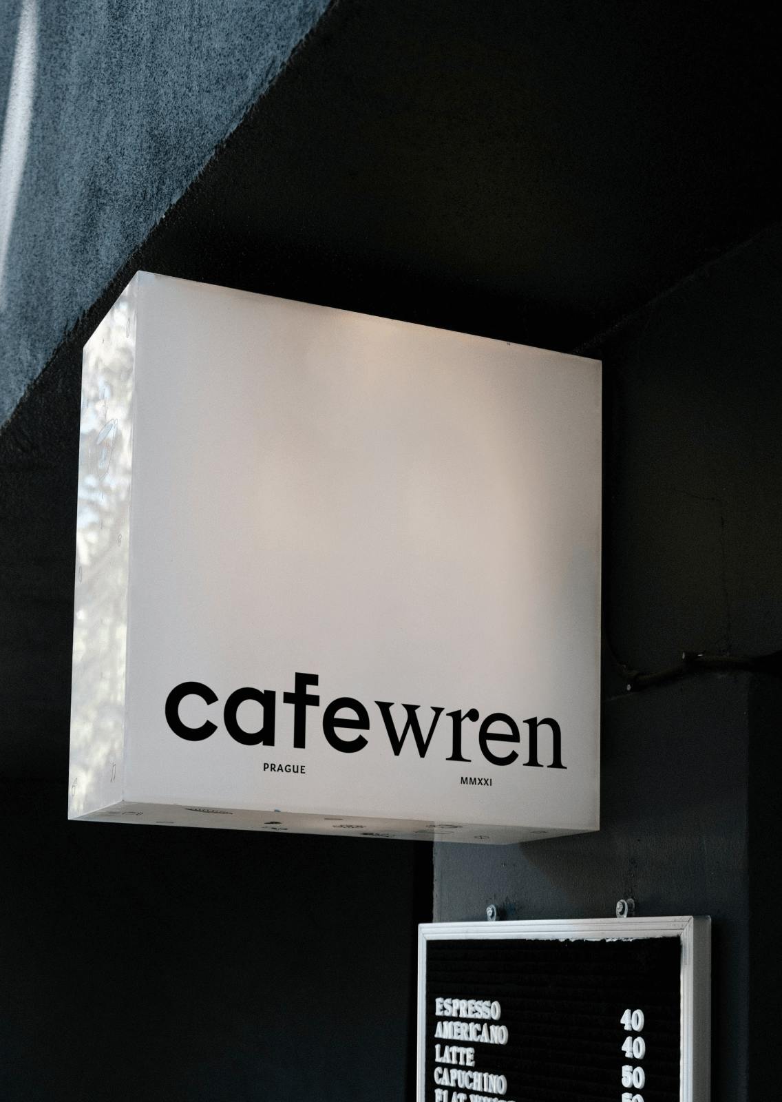 white retail sign with CafeWren written on it.