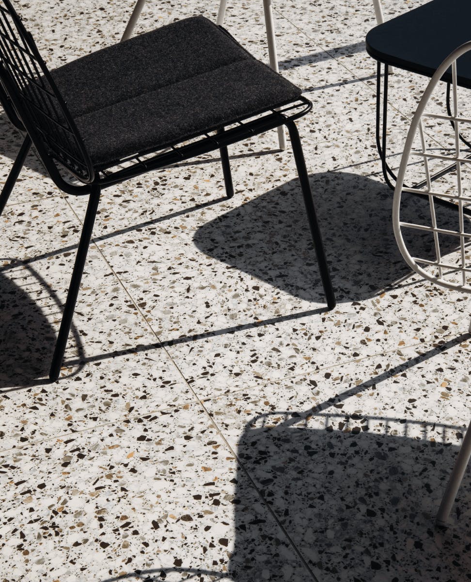 outdoor chairs on terrazzo tile