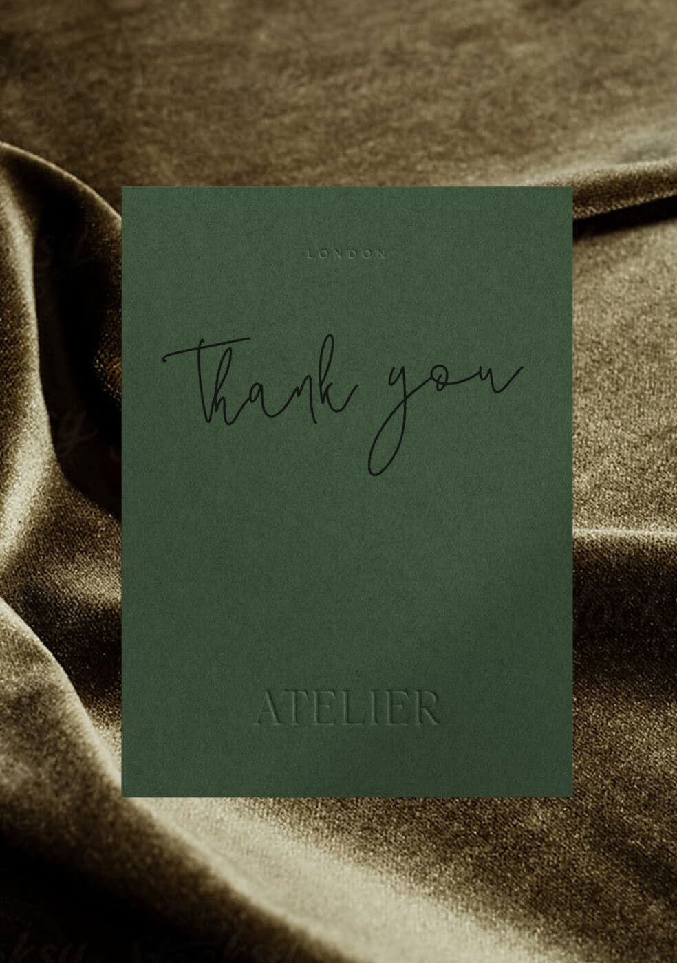 thank you card on top of velvet fabric