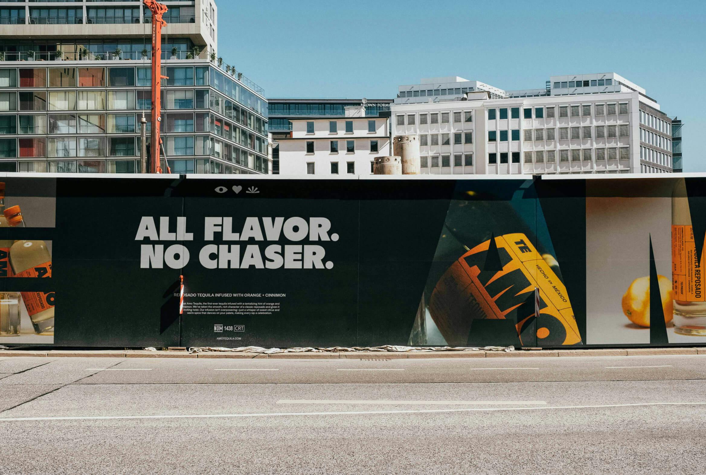 A hoarding poster of a liquor brand that says ALL FLAVOR, NO CHASER