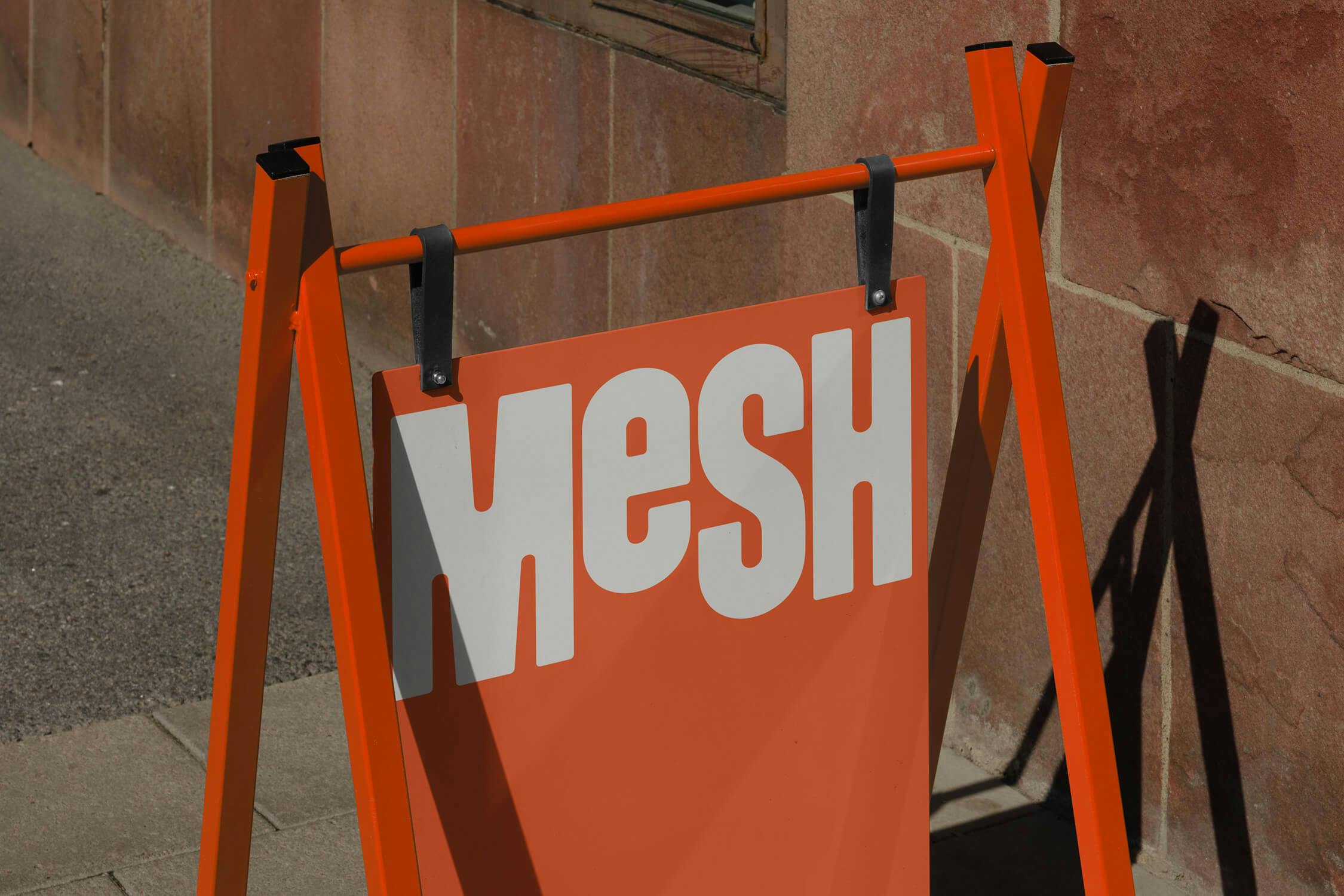 store signage with MESH logo