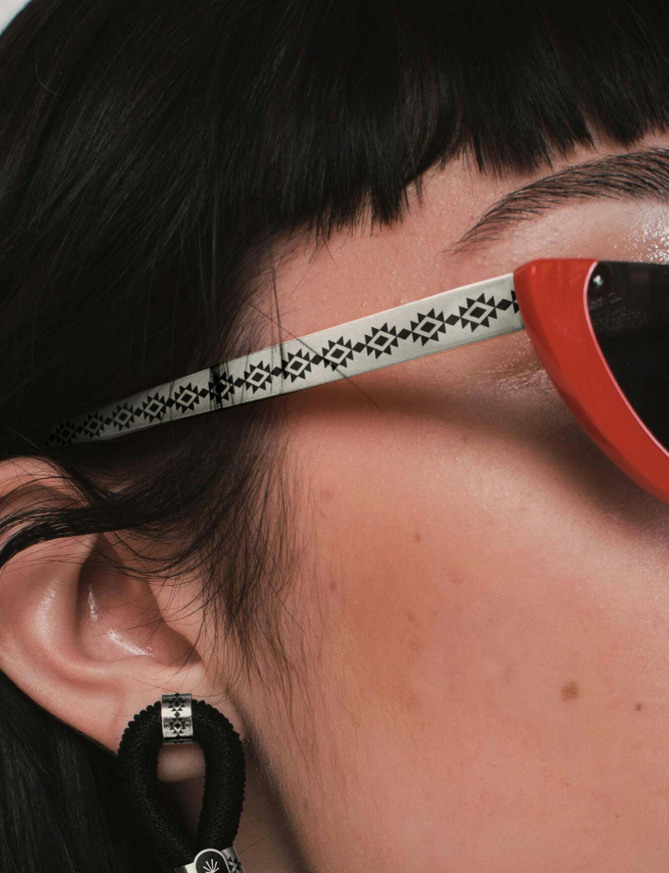 detail photo of a woman's sunglasses