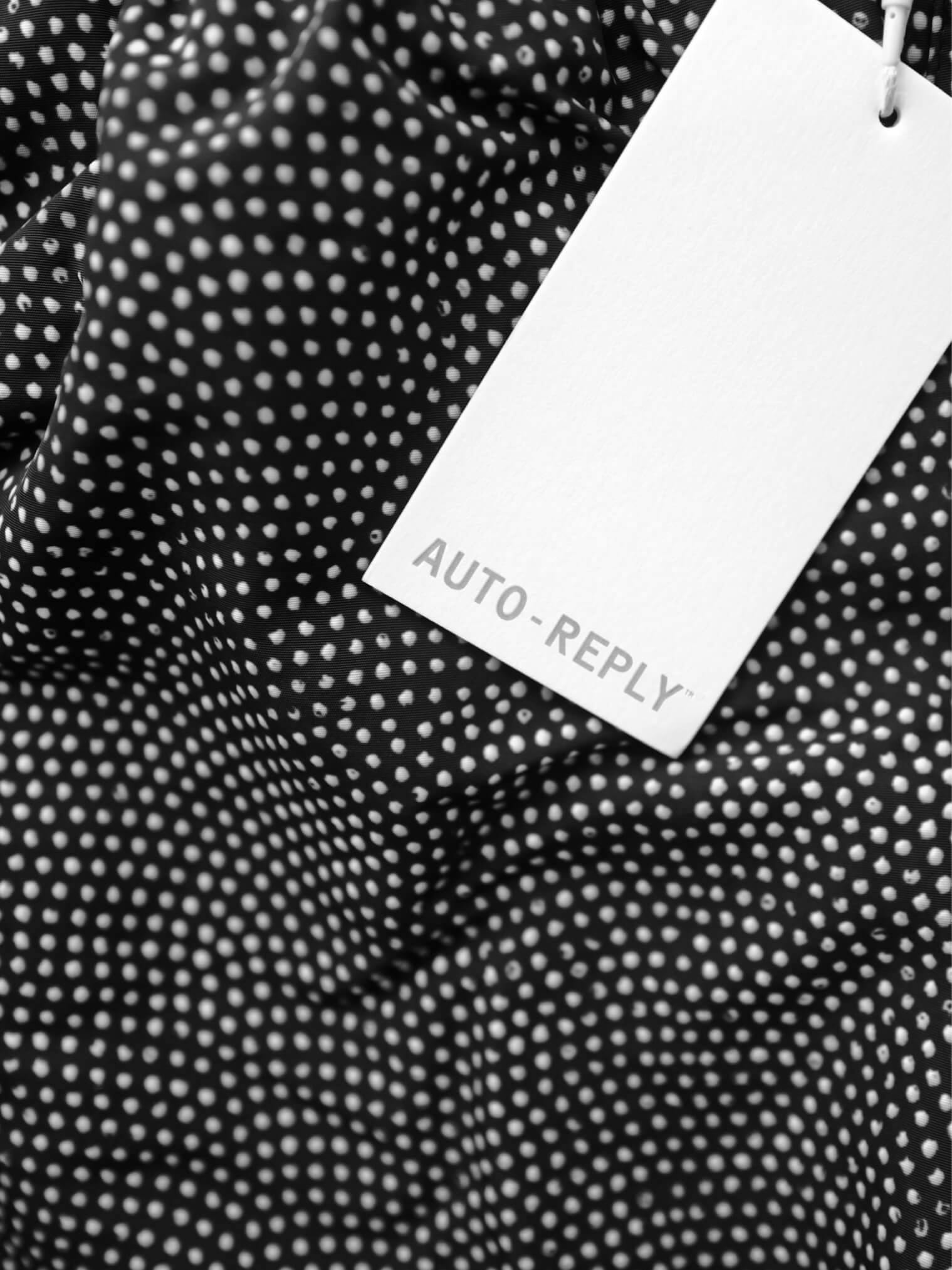 clothing tag on fabric with dots