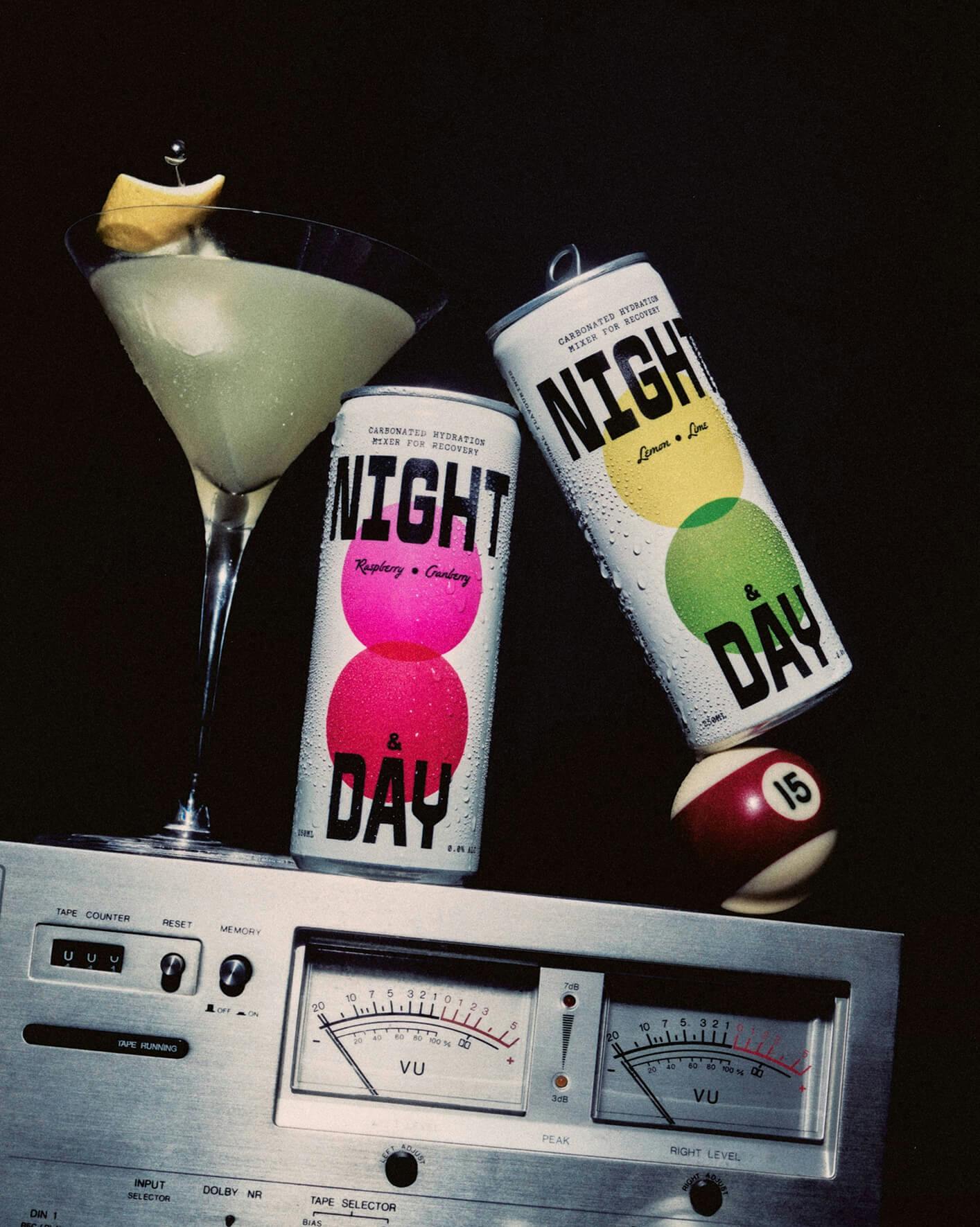 two canned beverages on top of vintage stereo