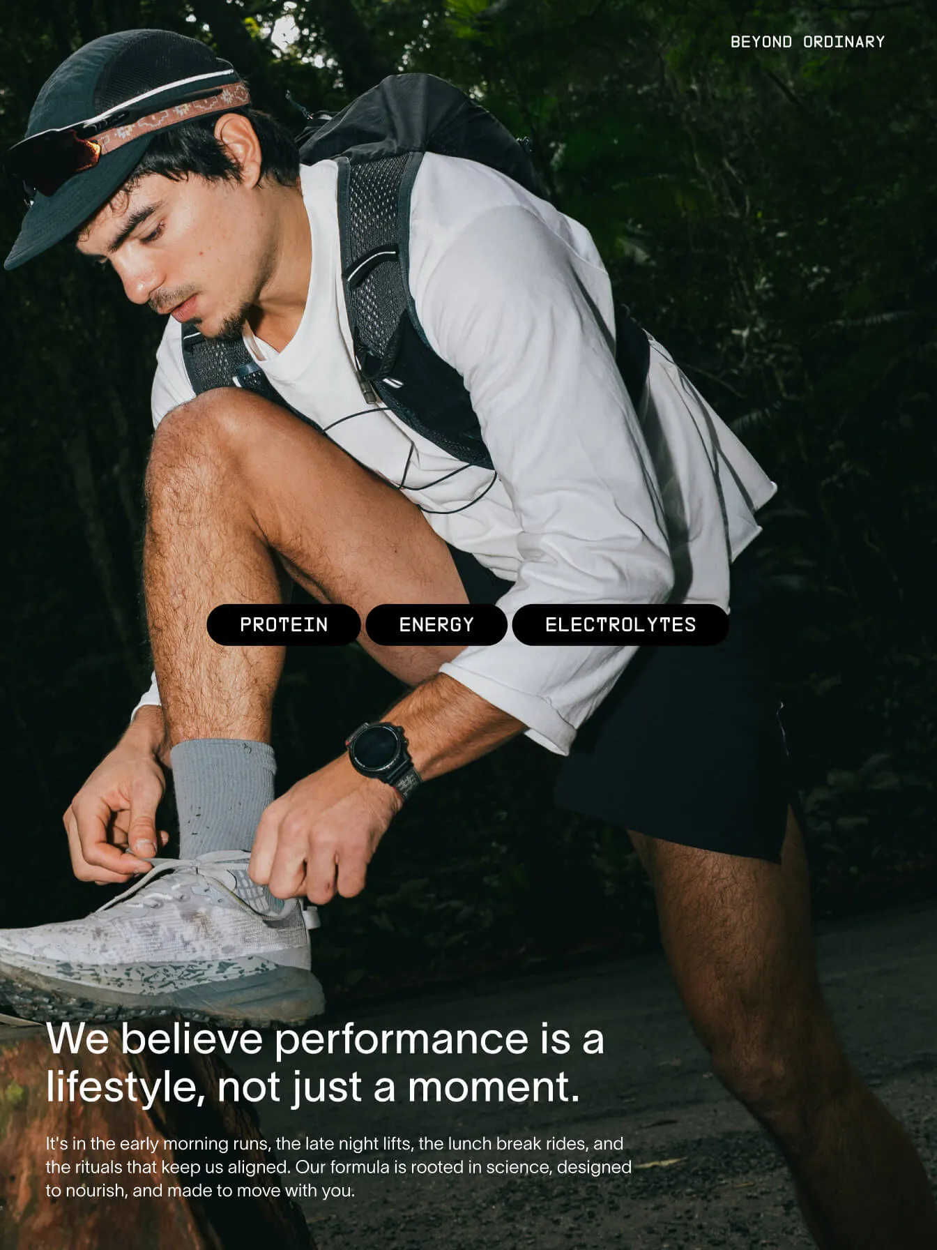 Layered editorial composition showing a runner ascending a rocky hillside with "ENERGY · HYDRATION · PROTEIN" overlaid, set against a blurred motion background of running legs