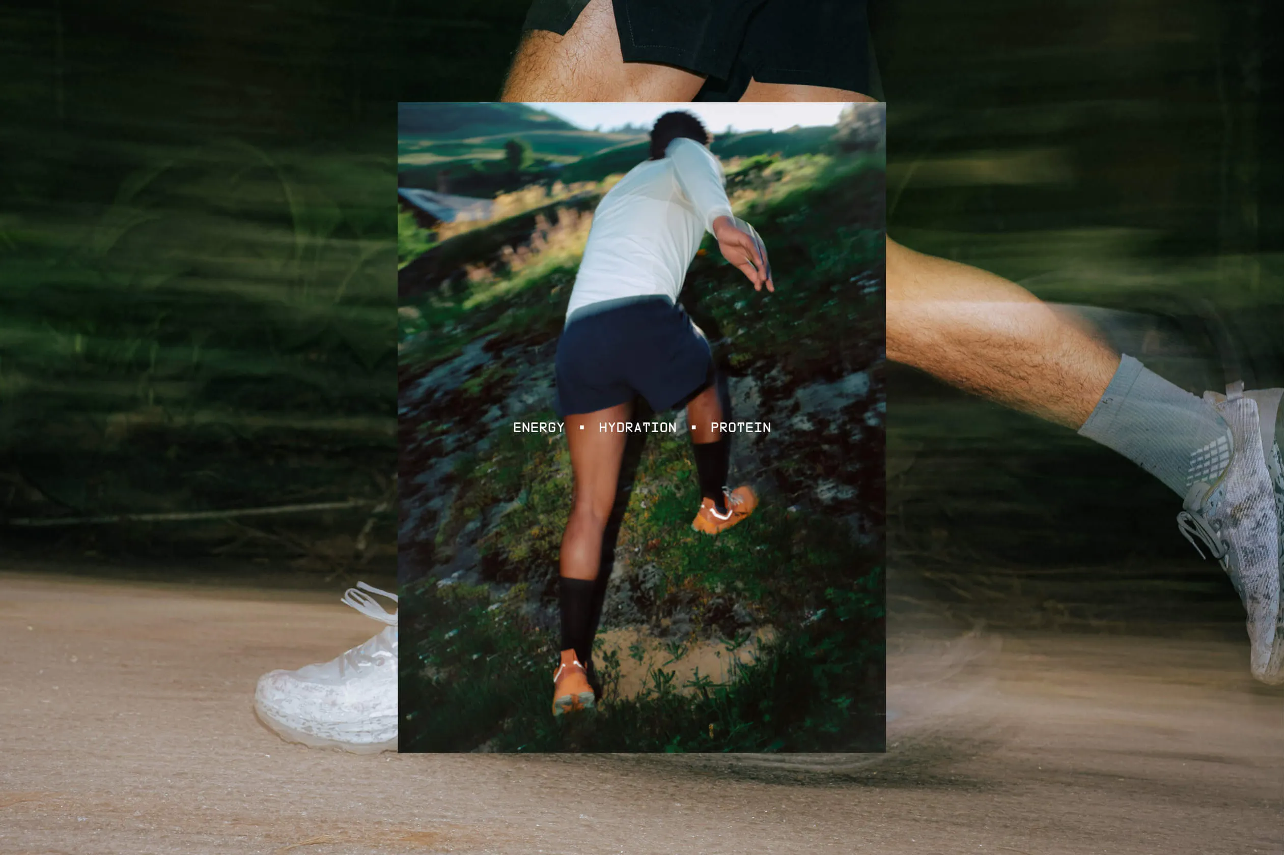 Layered editorial composition showing a runner ascending a rocky hillside with "ENERGY · HYDRATION · PROTEIN" overlaid, set against a blurred motion background of running legs