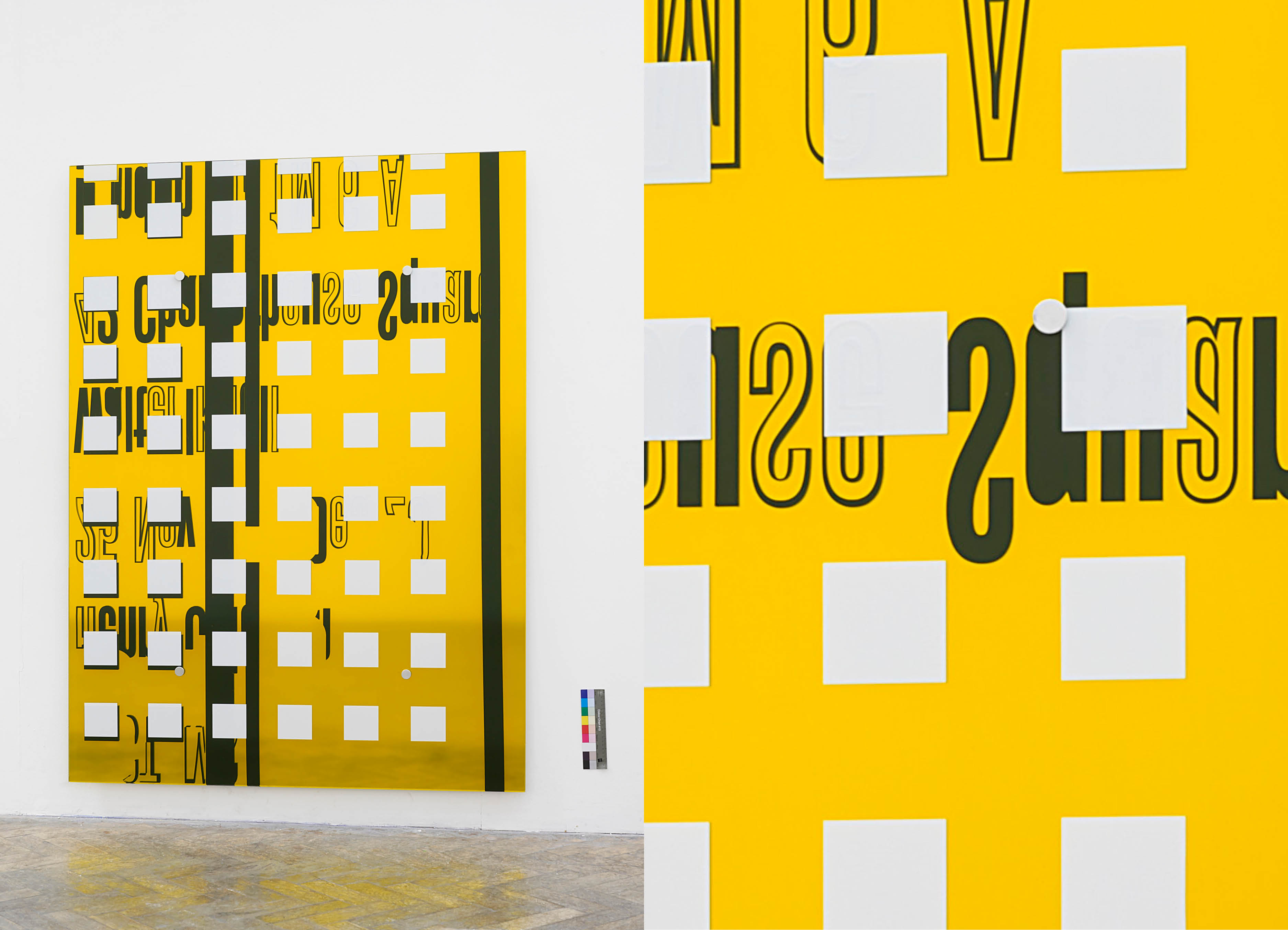 'Artifakt: Braun Plakat' mirror artwork and detail by artist Henry Coleman showing a yellow brightly colored mirror with applied overlapping pattern 