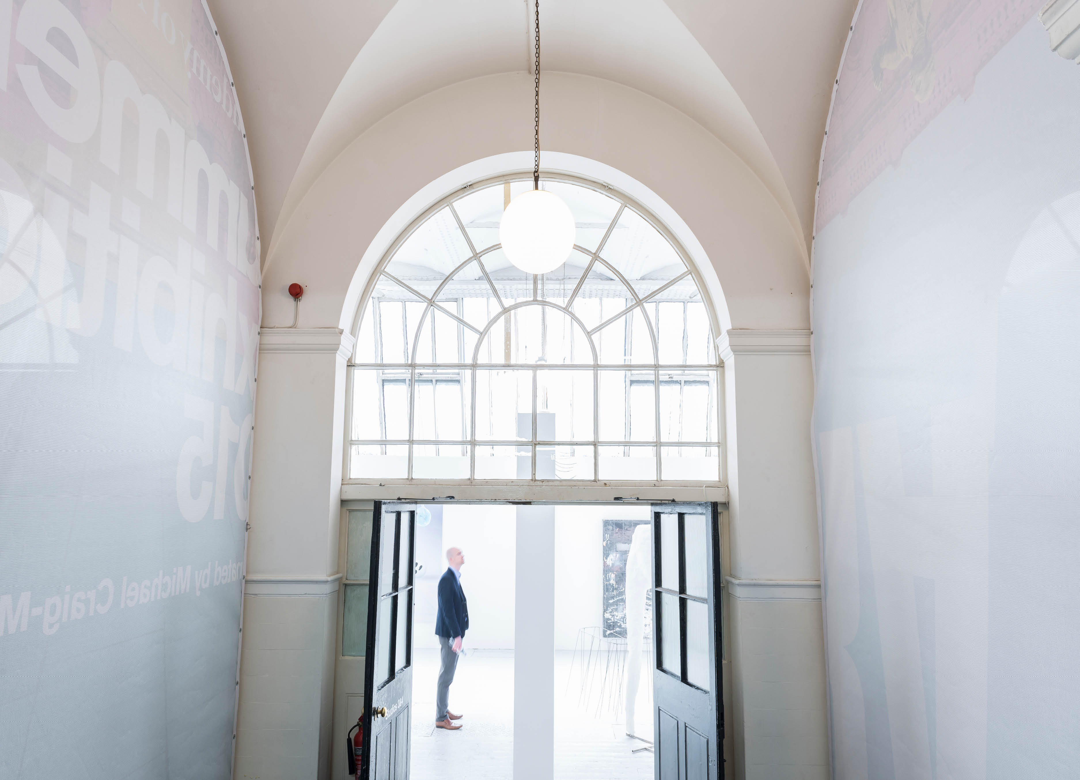 'The Greater Order', Sculptural installation by artist Henry Coleman across the Royal Academy buildings, London. Flag with an image of the Cast corridor, Royal Academy Schools,  flies in place of the RA flag on above the entry to 6 Burlington gardens