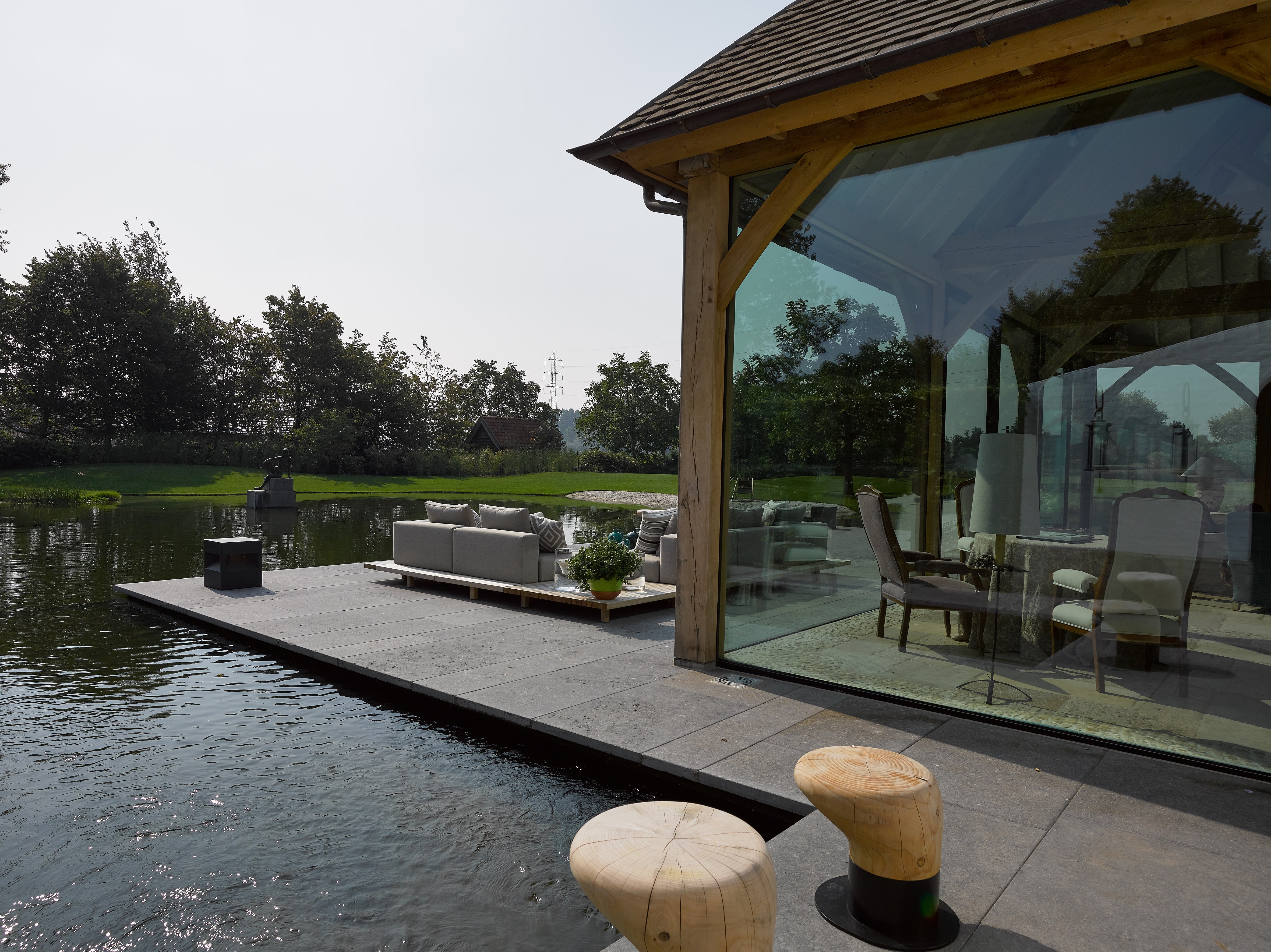 Inspiratie eikenhouten poolhouse met terras