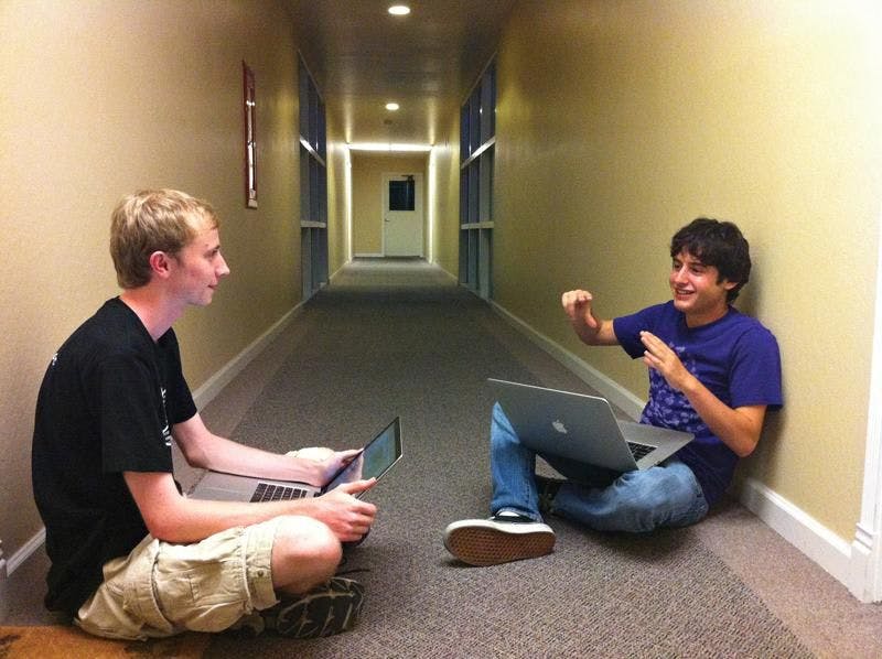 Brown University hallway, Evan Wallace, Dylan Field, Apple laptops