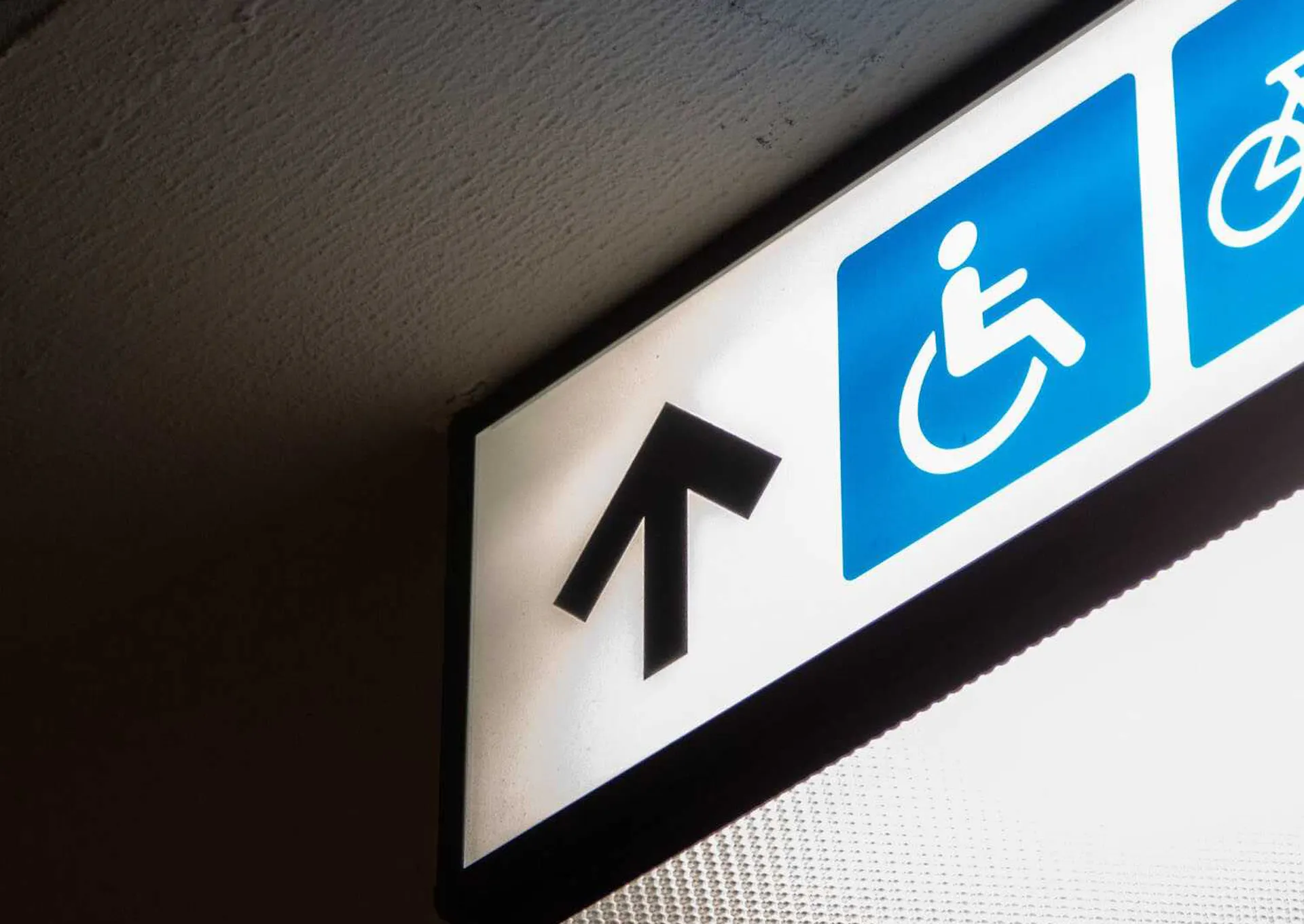 Accessible entrance sign