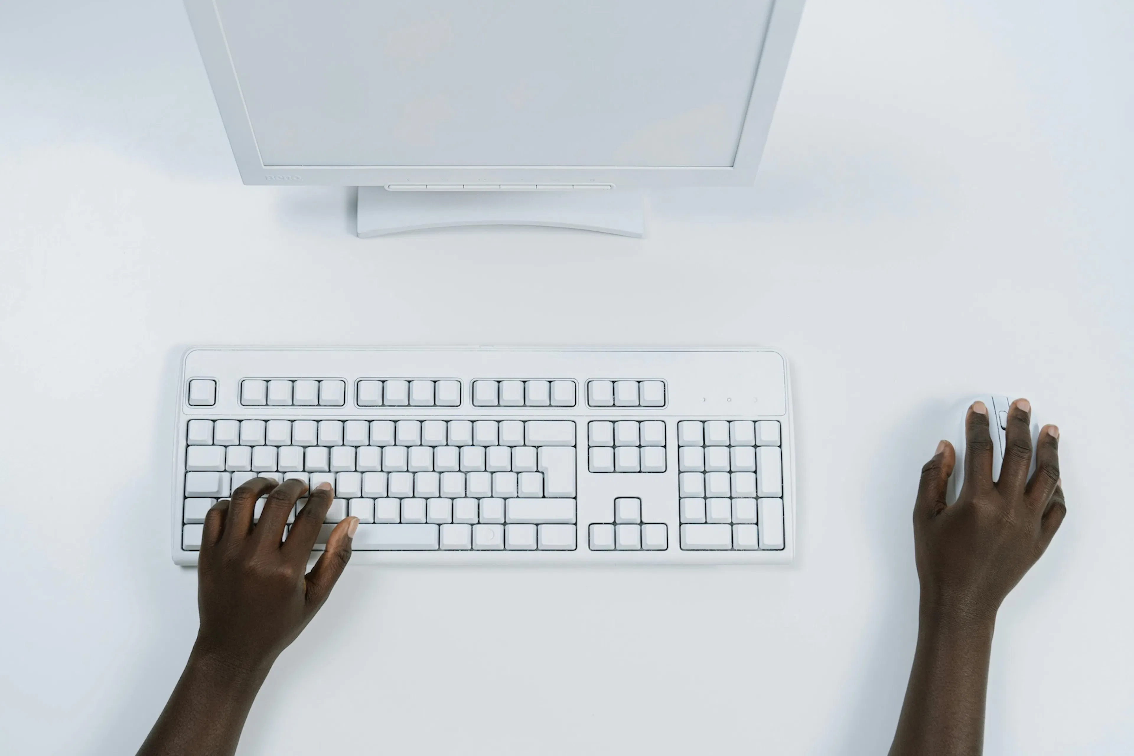 set of hands using computer