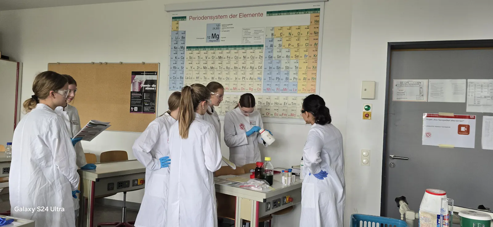 TUM programme students taking part in a lab