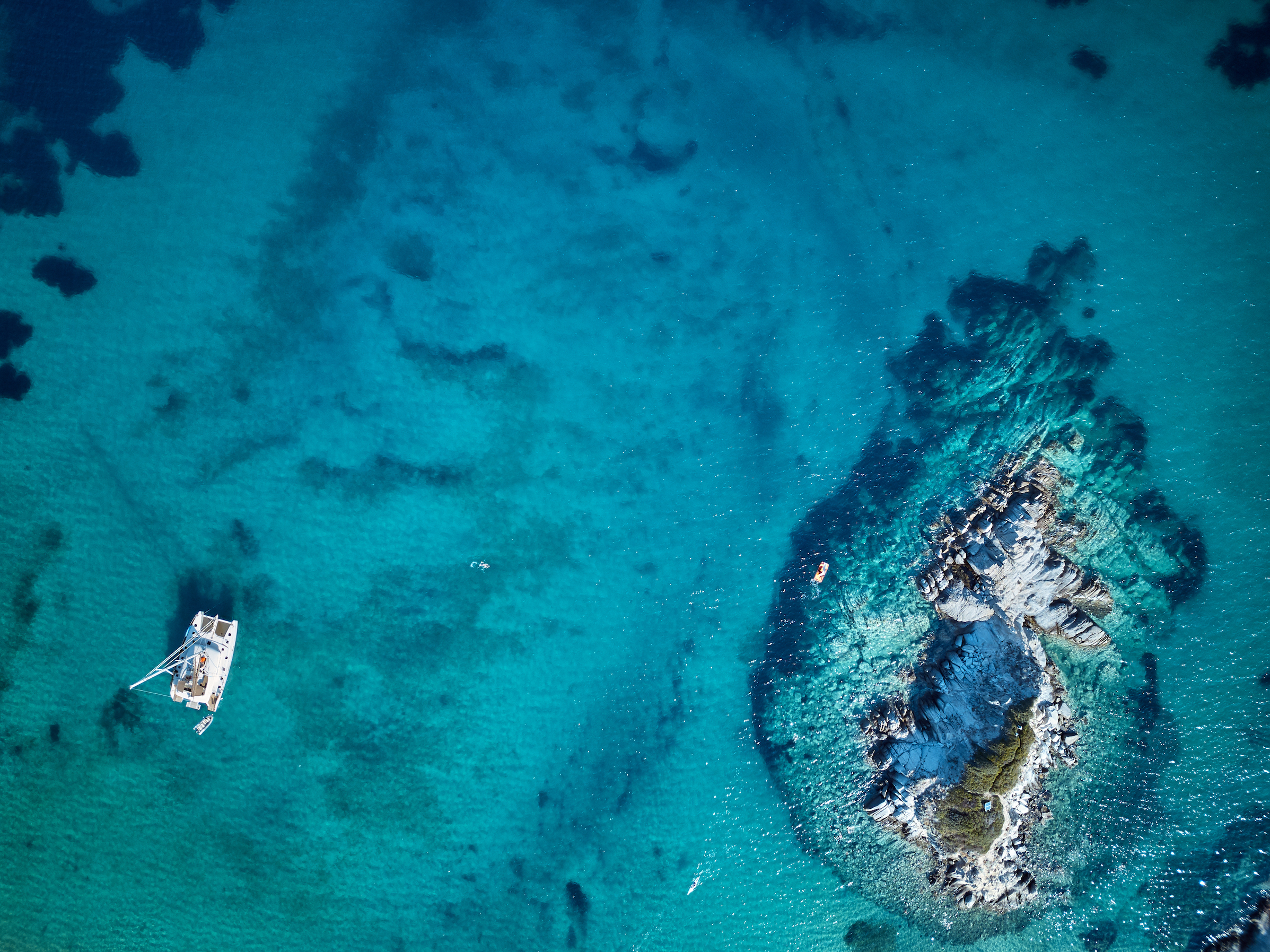 Catamaran on turquoise water
