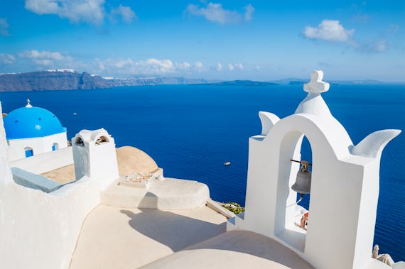 White roof in Santorini by the sea