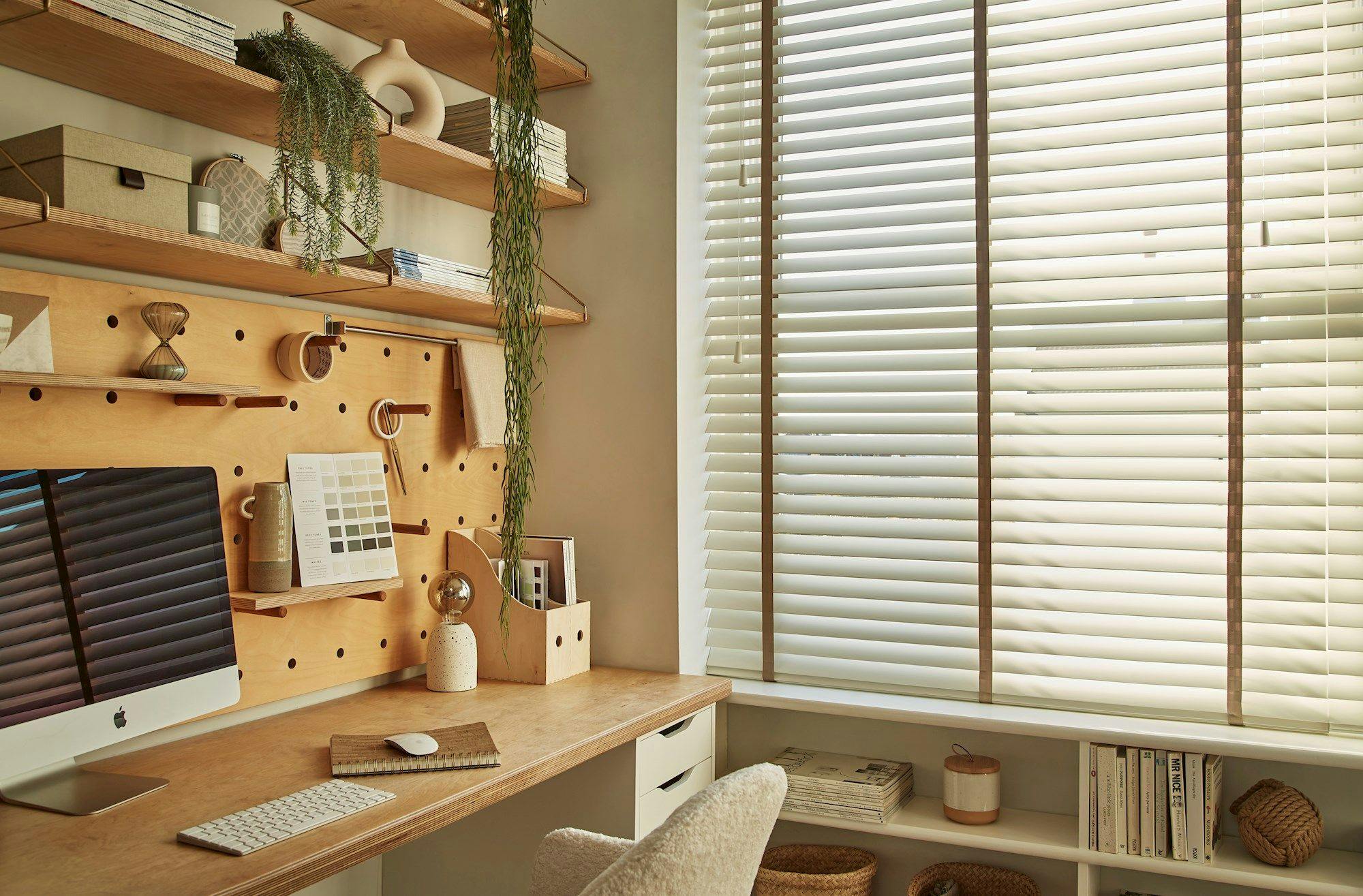 Ellwood wooden blind with taping.