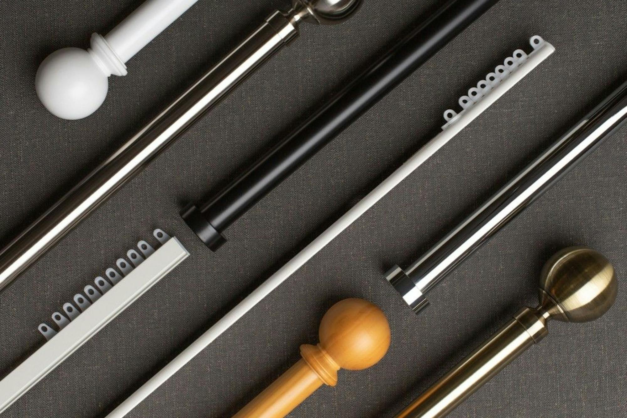 collection of curtain tracks and curtain poles