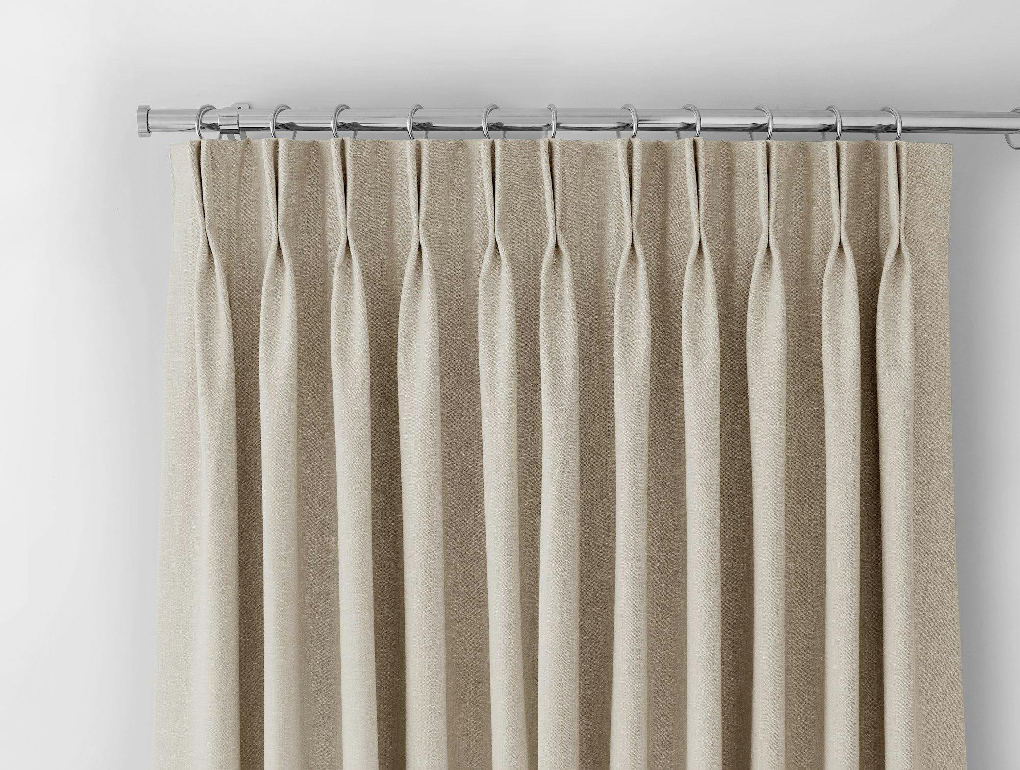 lyon oatmeal double pinch pleat curtain header on a silver curtain pole
