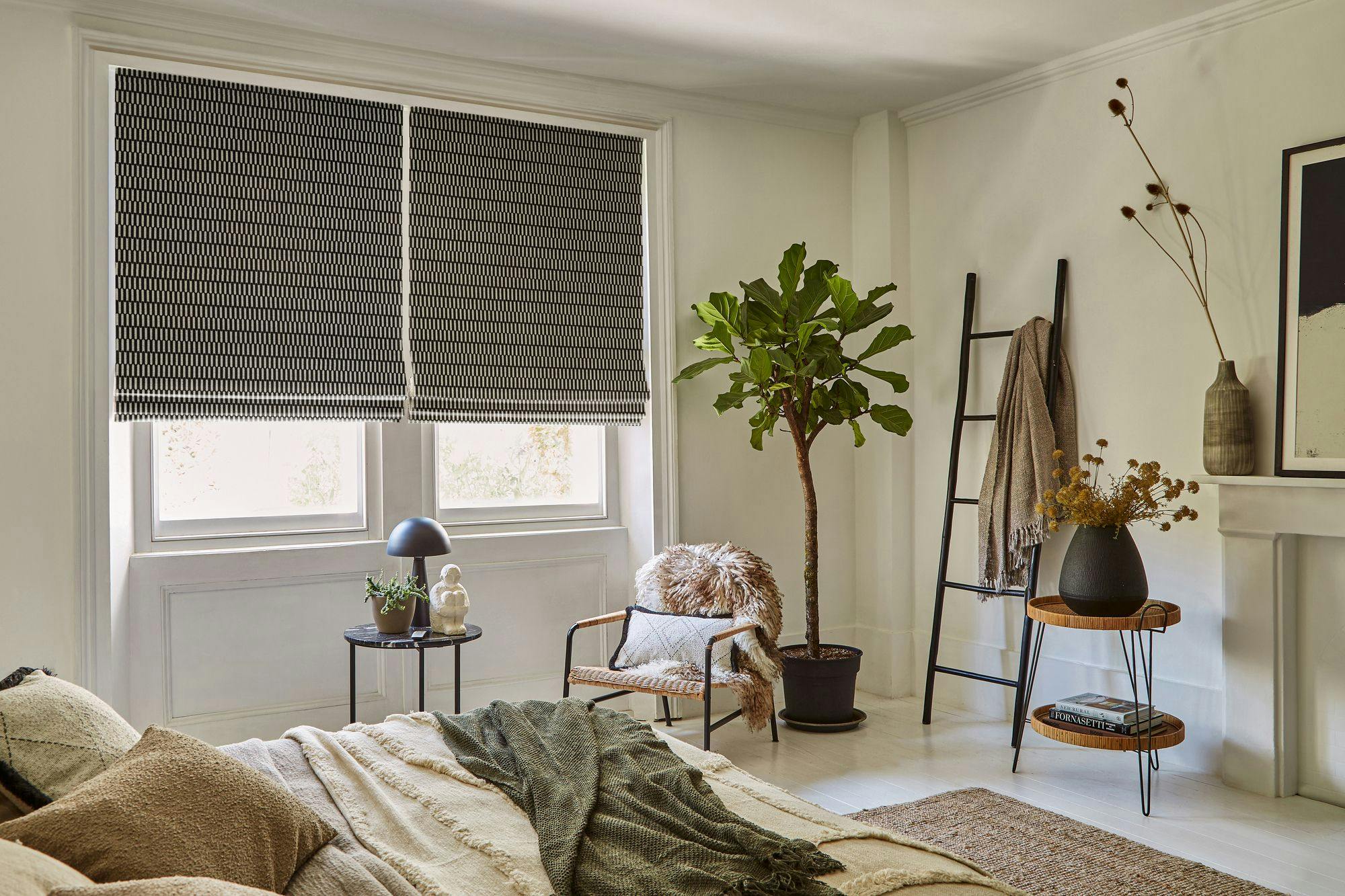 brown and white check patterned roman blind