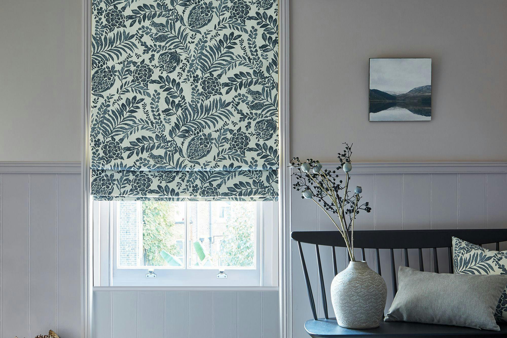 blue patterned roman blind
