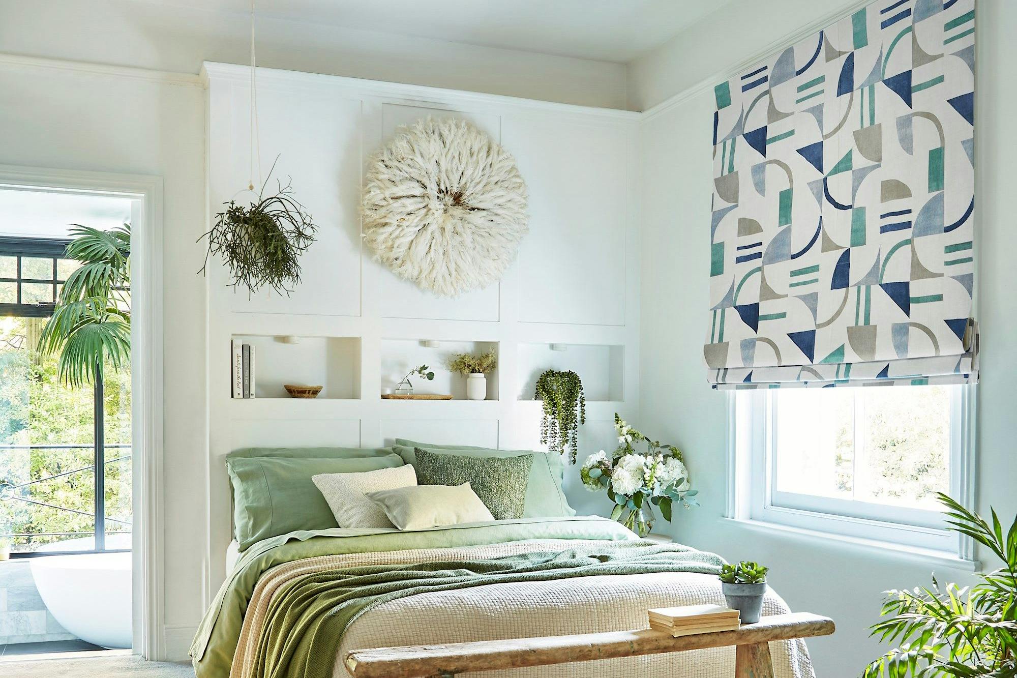Block ocean geometric roman blind in cosy spring/pastel themed bedroom