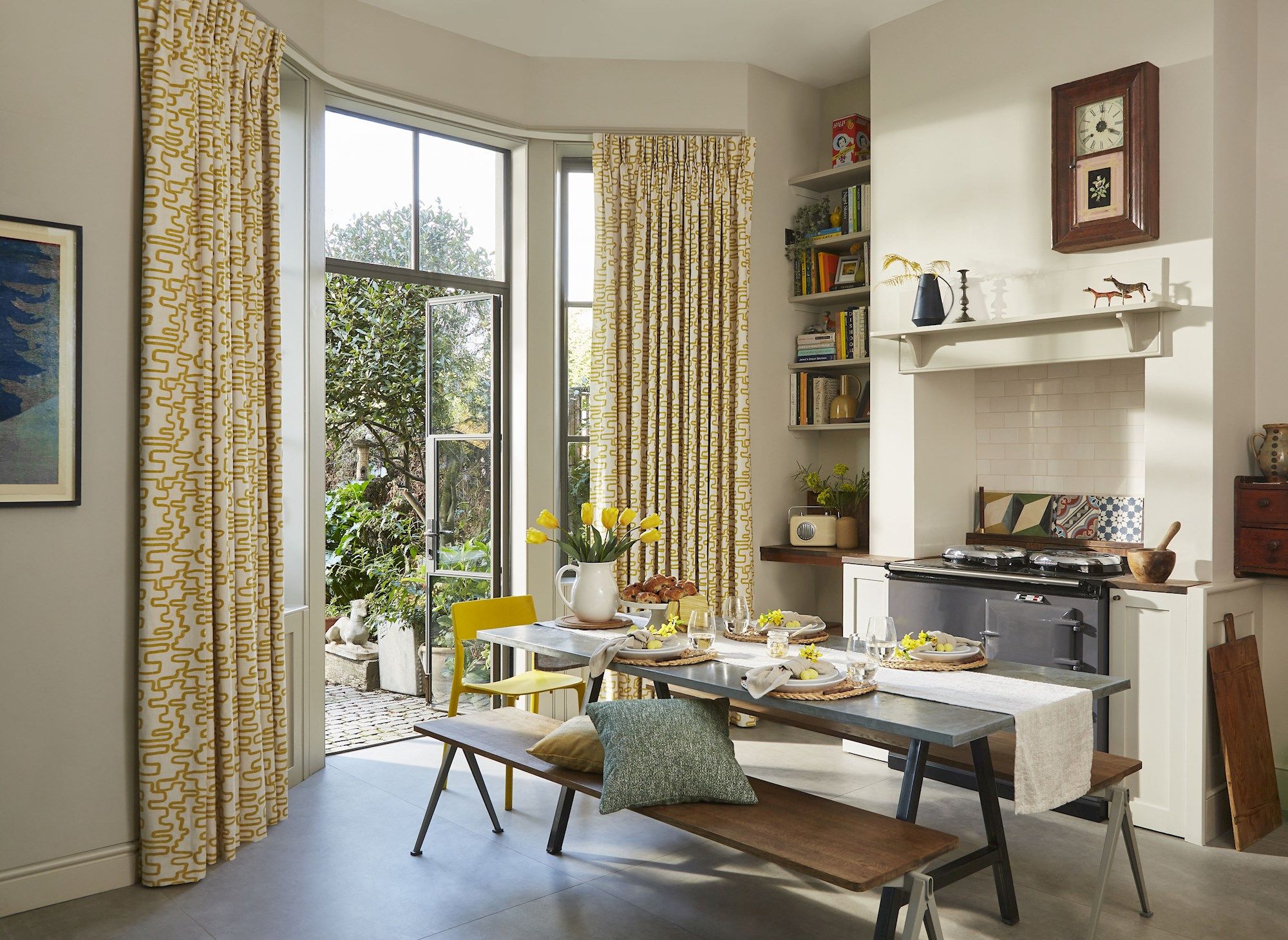 Wirl chartreuse yellow patterned curtains on bay window patio doors in kitchen/dining area