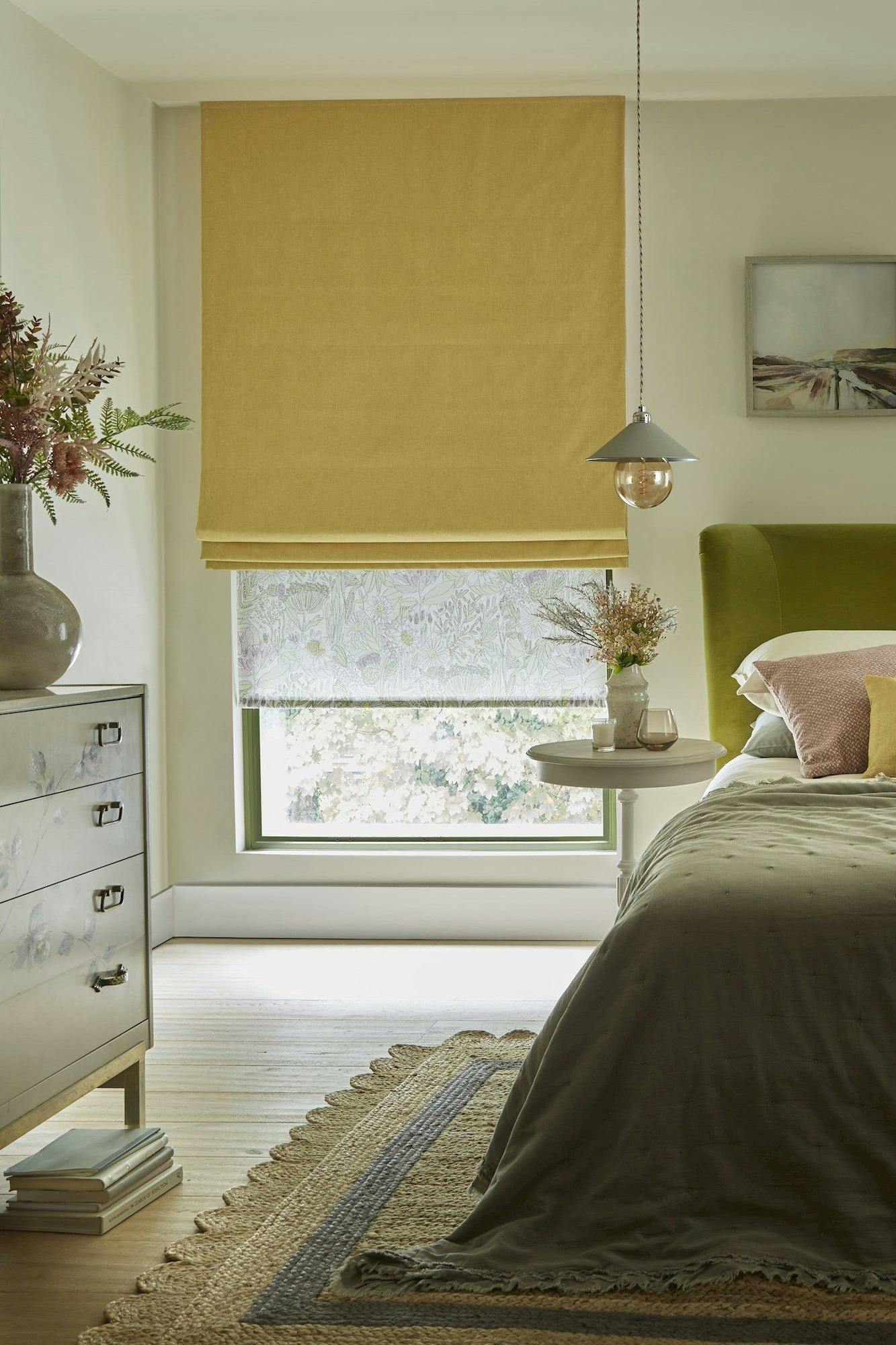 Harper sunshine roman blinds paired with daisy spring roller blinds in pastel themed bedroom