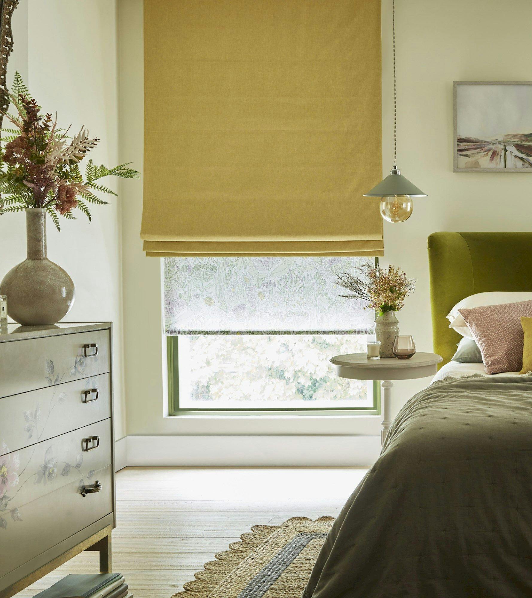 Harper sunshine roman blinds paired with daisy spring roller blinds in pastel themed bedroom