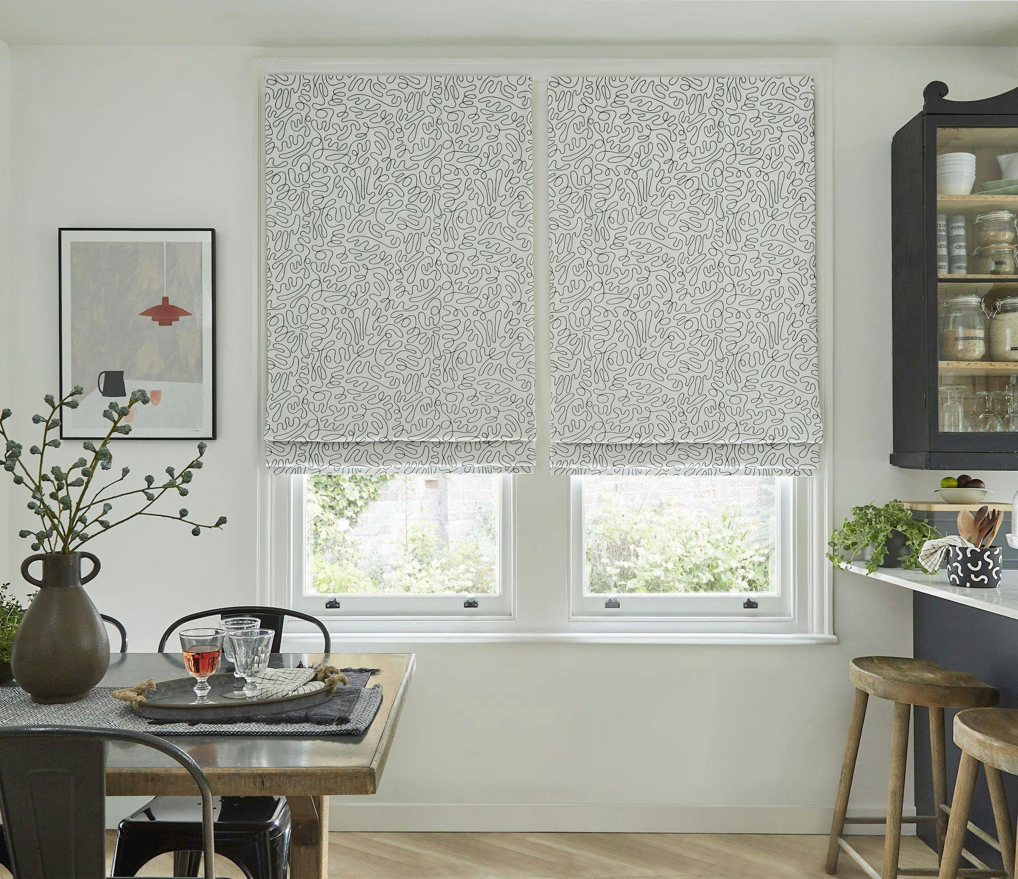 Matisse monochrome roman blinds in rustic kitchen/dining area