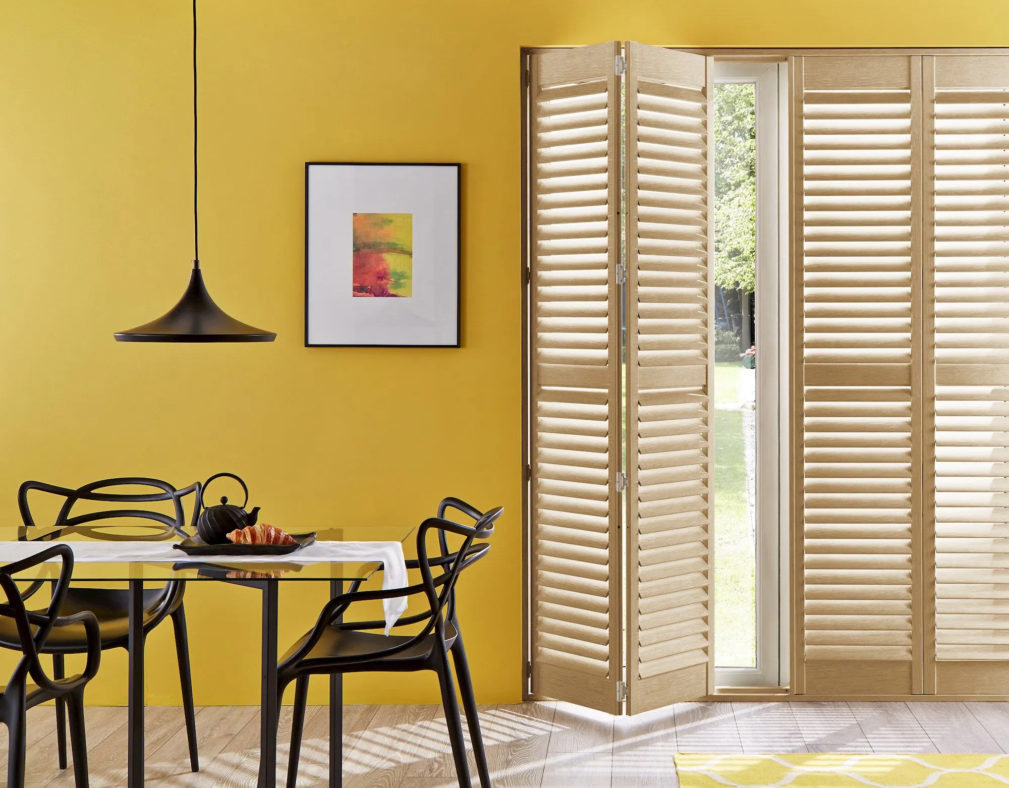 oak wooden tracked shutter on patio door to dining room